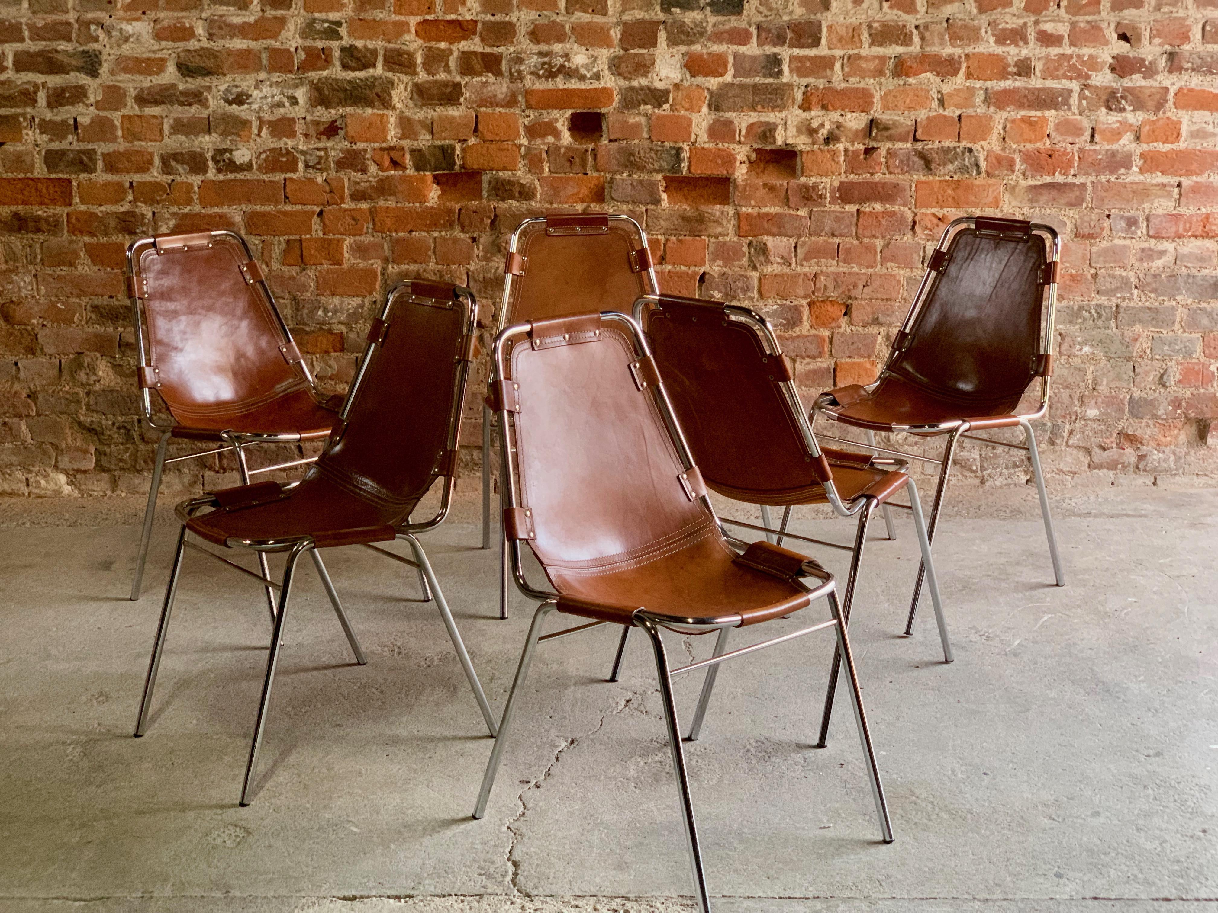 Les Arcs' Six Dining Chairs, 1970s

Fabulous set of six tan leather 'Les Arcs' dining chairs manufactured by the Italian firm, Dal Vera, and selected by Charlotte Perriand for the Les Arcs ski resort,, each chair consists of a chrome tubular frame