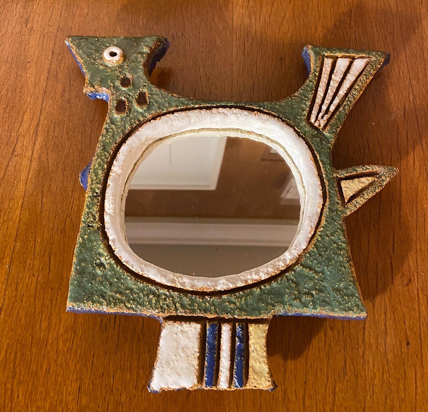 Ceramic mirror, France, Vallauris, 1960s
Attibuted to Les Argonautes (Frédérique Bourguet and Isabelle Ferlay), french workshop created in Vallauris, south of France, in 1953 and active until the death of Federique Bourguet in 1997.