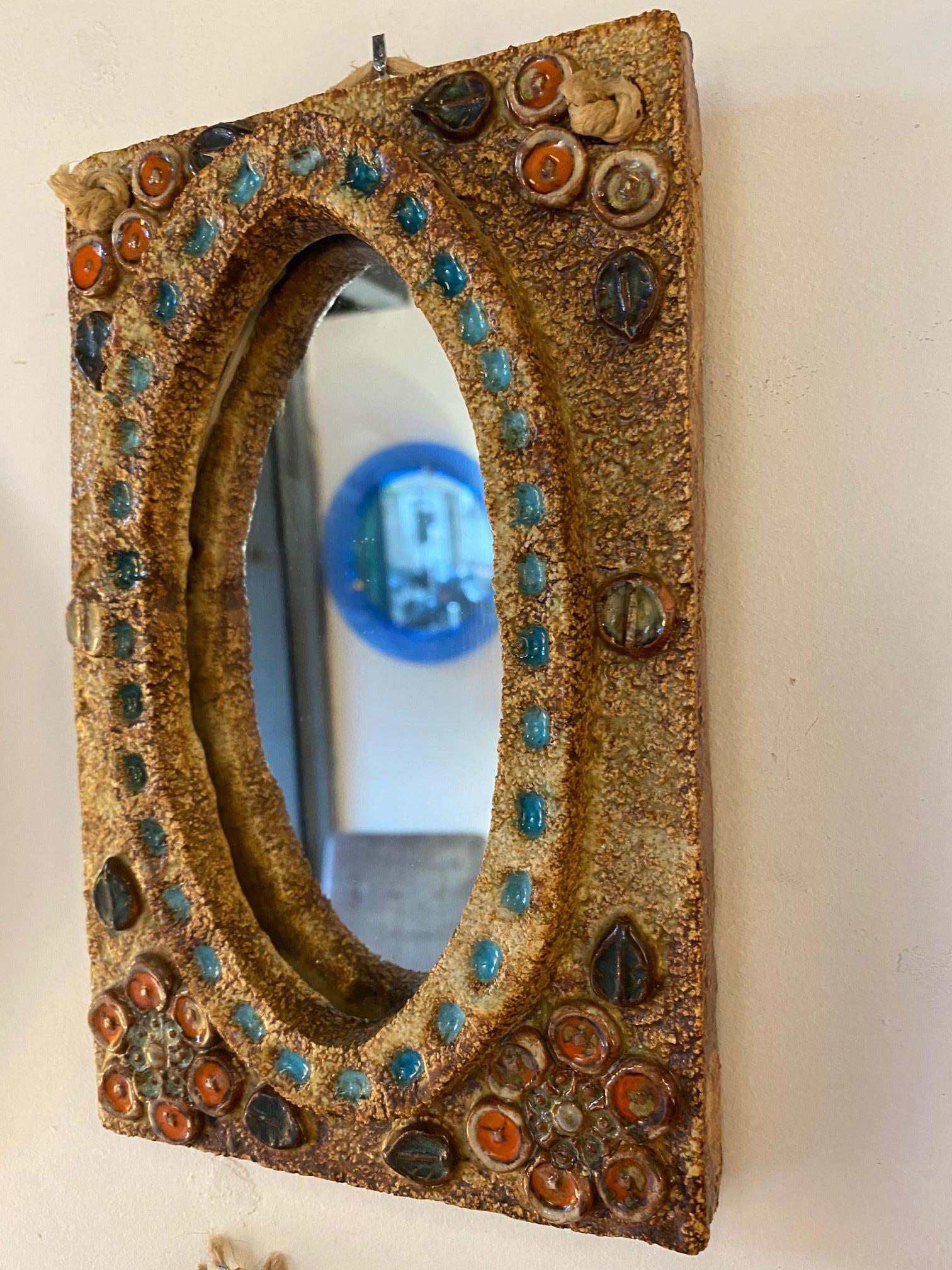 Ceramic mirror, France, Vallauris, 1960s
Attibuted to Les Argonautes (Frédérique Bourguet and Isabelle Ferlay), French workshop created in Vallauris, south of France, in 1953 and active until the death of Federique Bourguet in 1997.