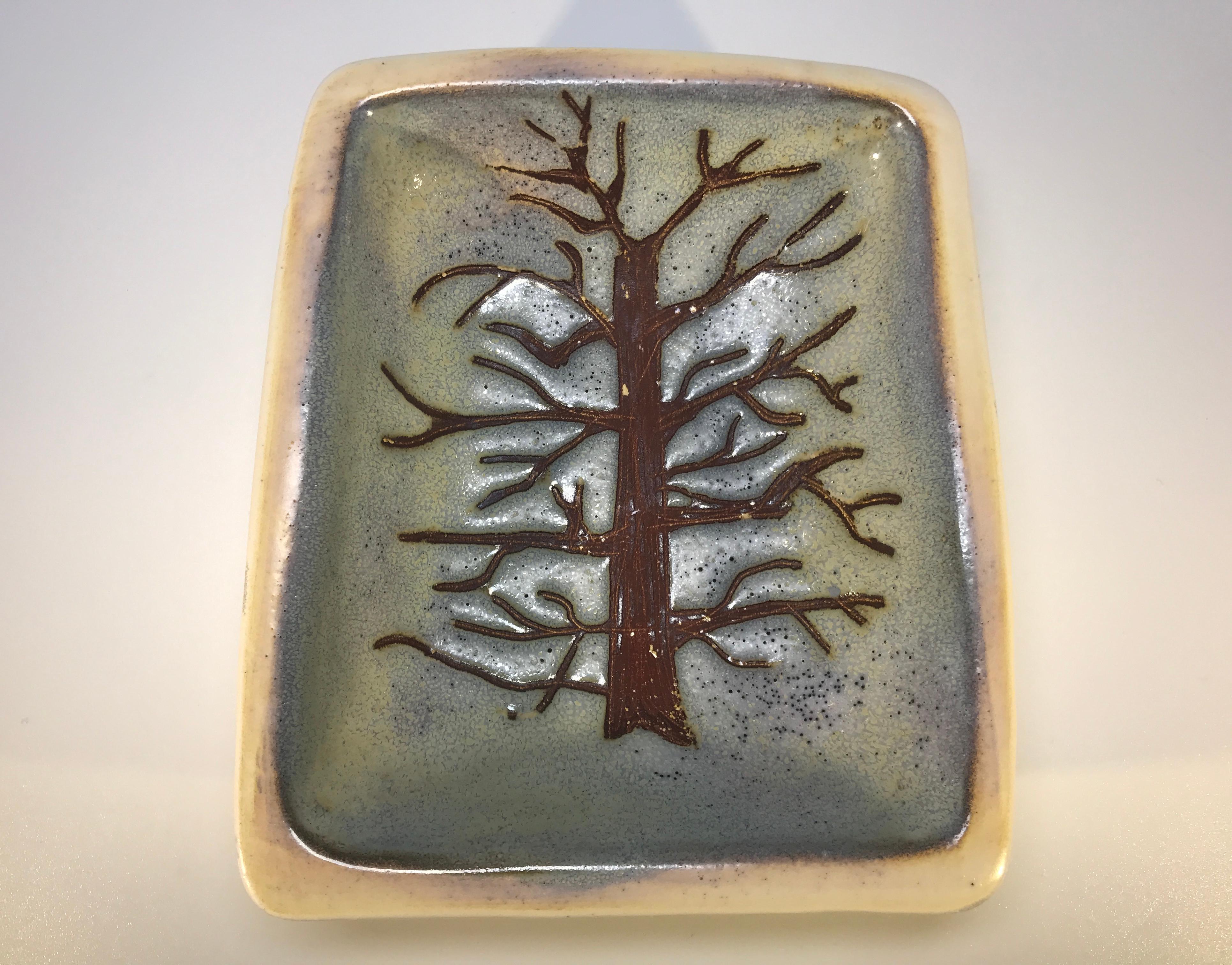 Ceramic Tree vidé poche from the studio of Les Argonautes for Vallauris, France.
Understated glaze technique exemplifies the art of Isabelle Ferlay and Frederique Bourguet,
circa 1950s
Signed Les Argonautes, Vallauris to base
Measures: Height