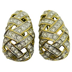 LES BERNARD - Boucles d'oreilles à clip signées et ornées de strass massifs.