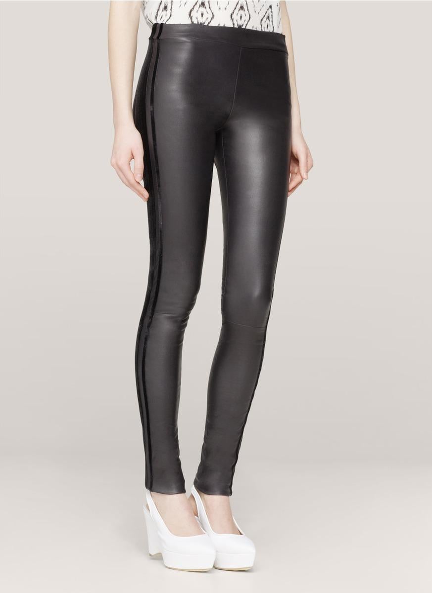 Les Chiffoniers Grey Leather Velvet Trim Leggings

- Signature stretch-leather leggings
- Navy velvet side stripe 
- Elasticated waist 
- Raw cuffs 
- Pull on style 

Materials: 
Main - 100% Lamb Leather 

Professional Leather Dry Clean Only 

Made