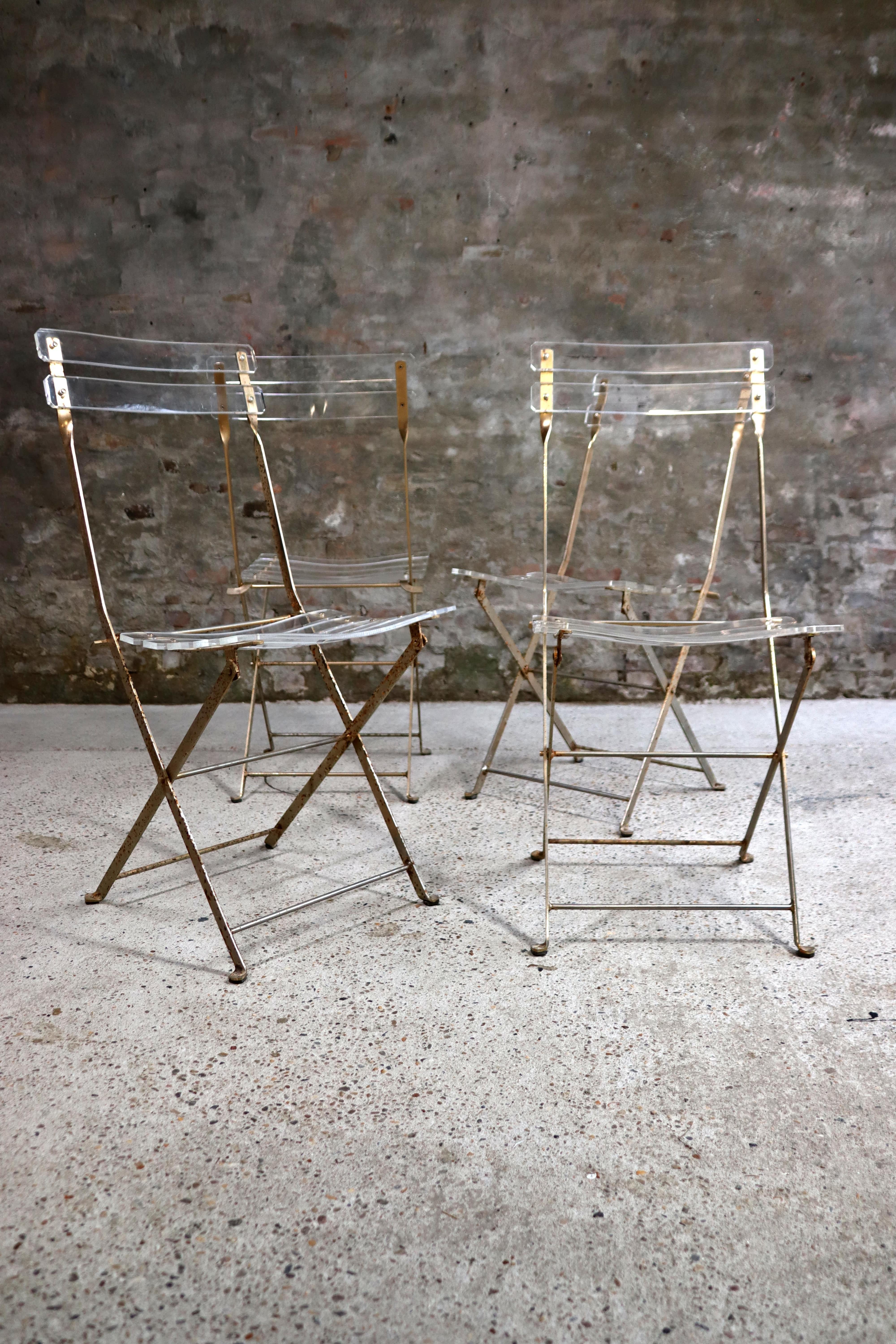 Yonel Lebovici (1937-1998) and Bernard Berthet designed these transparent folding chairs and gave this series the name: “Les Invisibles”. Made for Marais International in 1973. The white-gold color frame is made of steel and the slats are made of