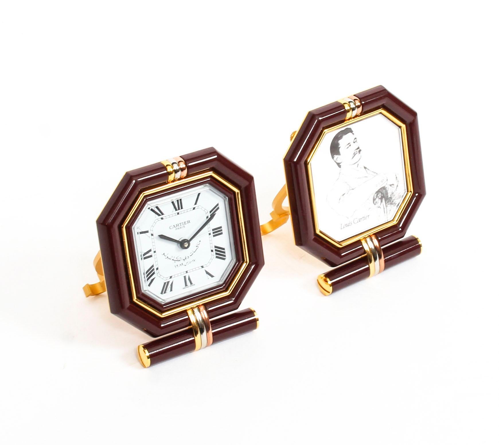 French Les Must de Cartier Paris Cased Maroon and Gilt Desk Clock and Photo Frame