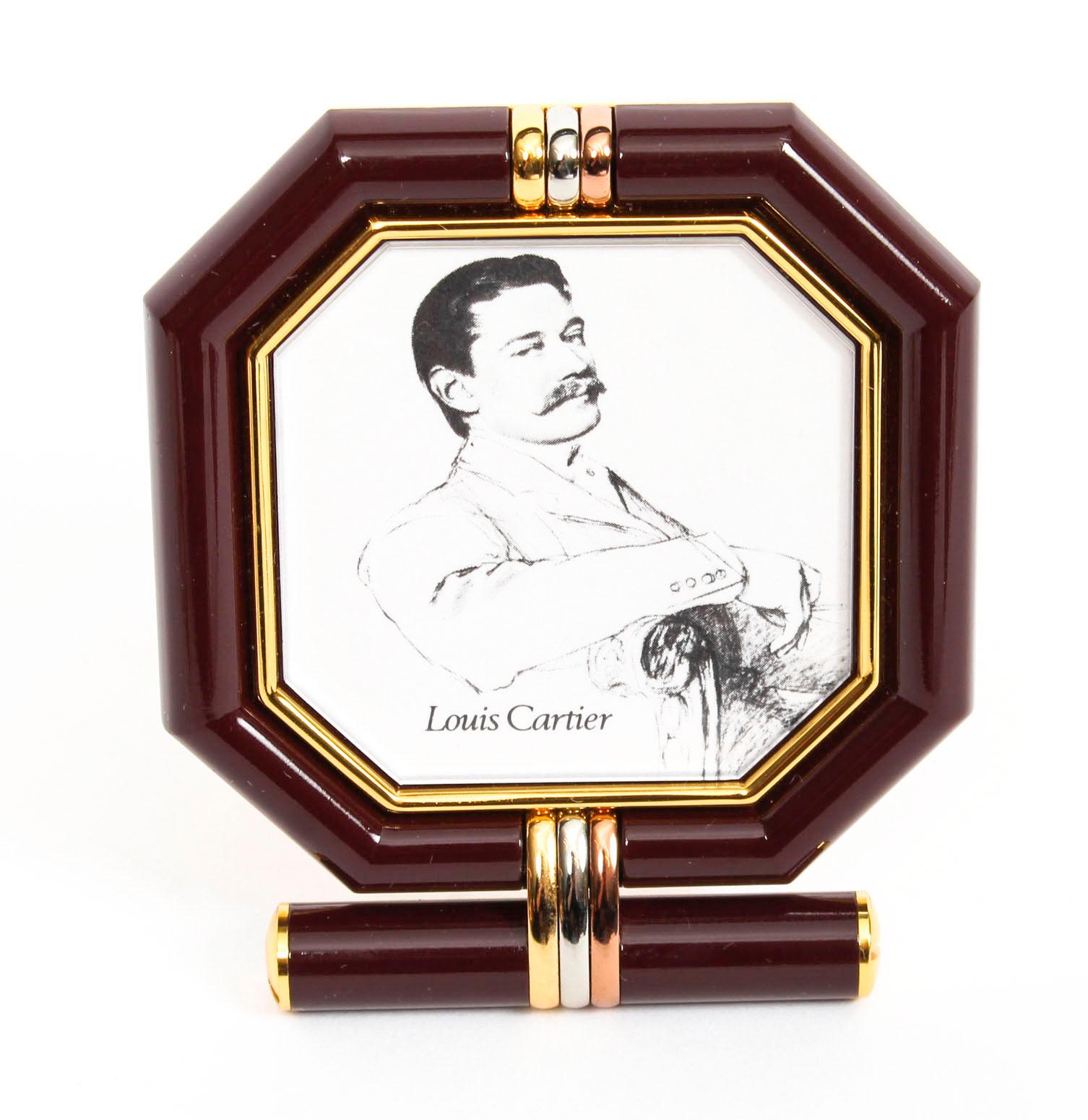 Late 20th Century Les Must de Cartier Paris Cased Maroon and Gilt Desk Clock and Photo Frame