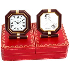 Vintage Les Must de Cartier Paris Cased Maroon and Gilt Desk Clock and Photo Frame