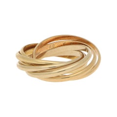 Les Must de Cartier Seven Band Trinity Ring 18 Karat Tri-Gold