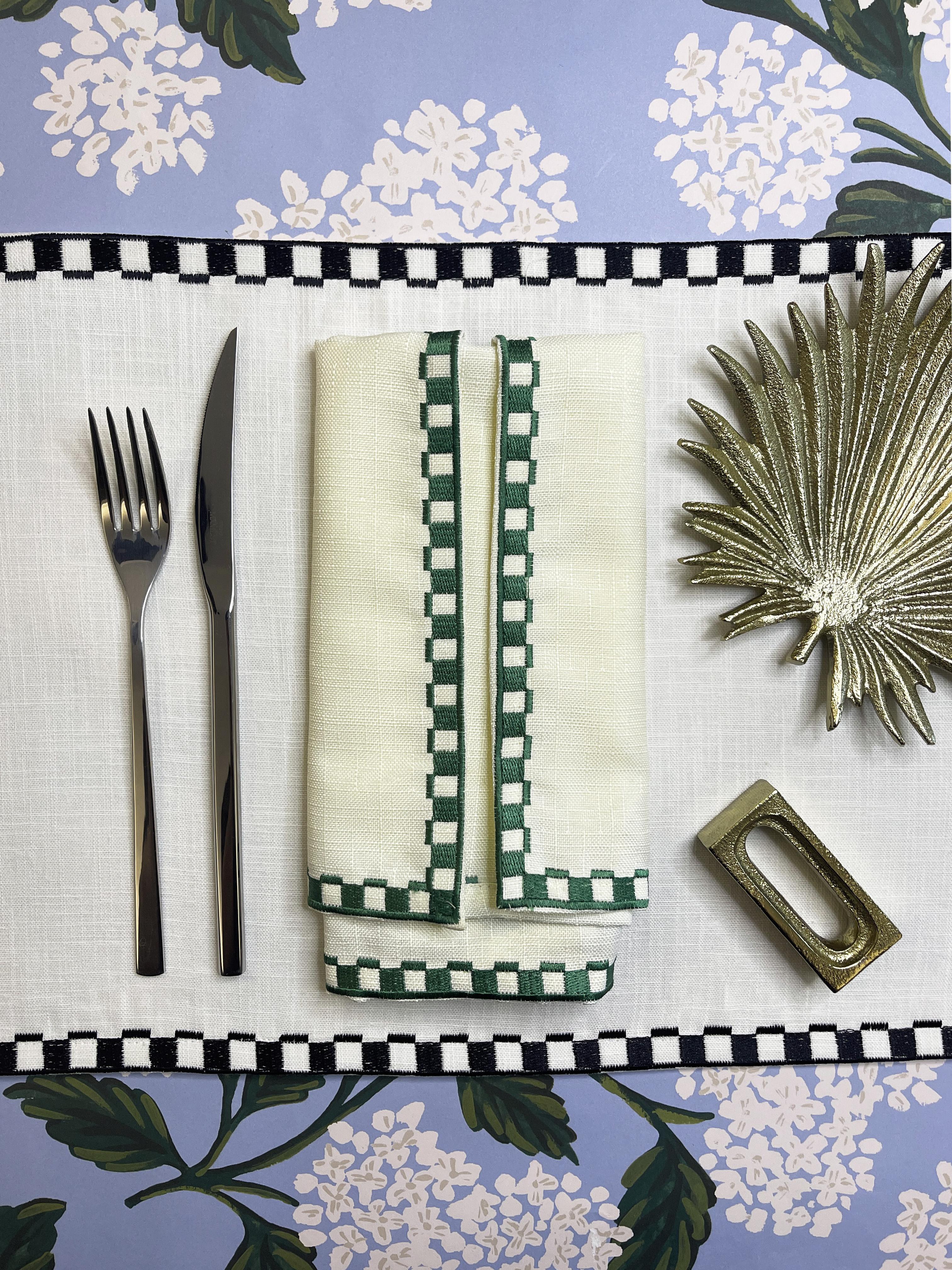The Les Noelles dinner napkin will elevate your dining experience. The 100% linen napkin features embroidered geometrical patterns that outline the edge and gives the napkin a finished look. This is a set of 4 napkins.

100% Linen
Dimension: 22