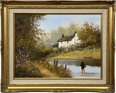 Young Boy Fishing in River with Cottage in Wild Meadow in English Countryside