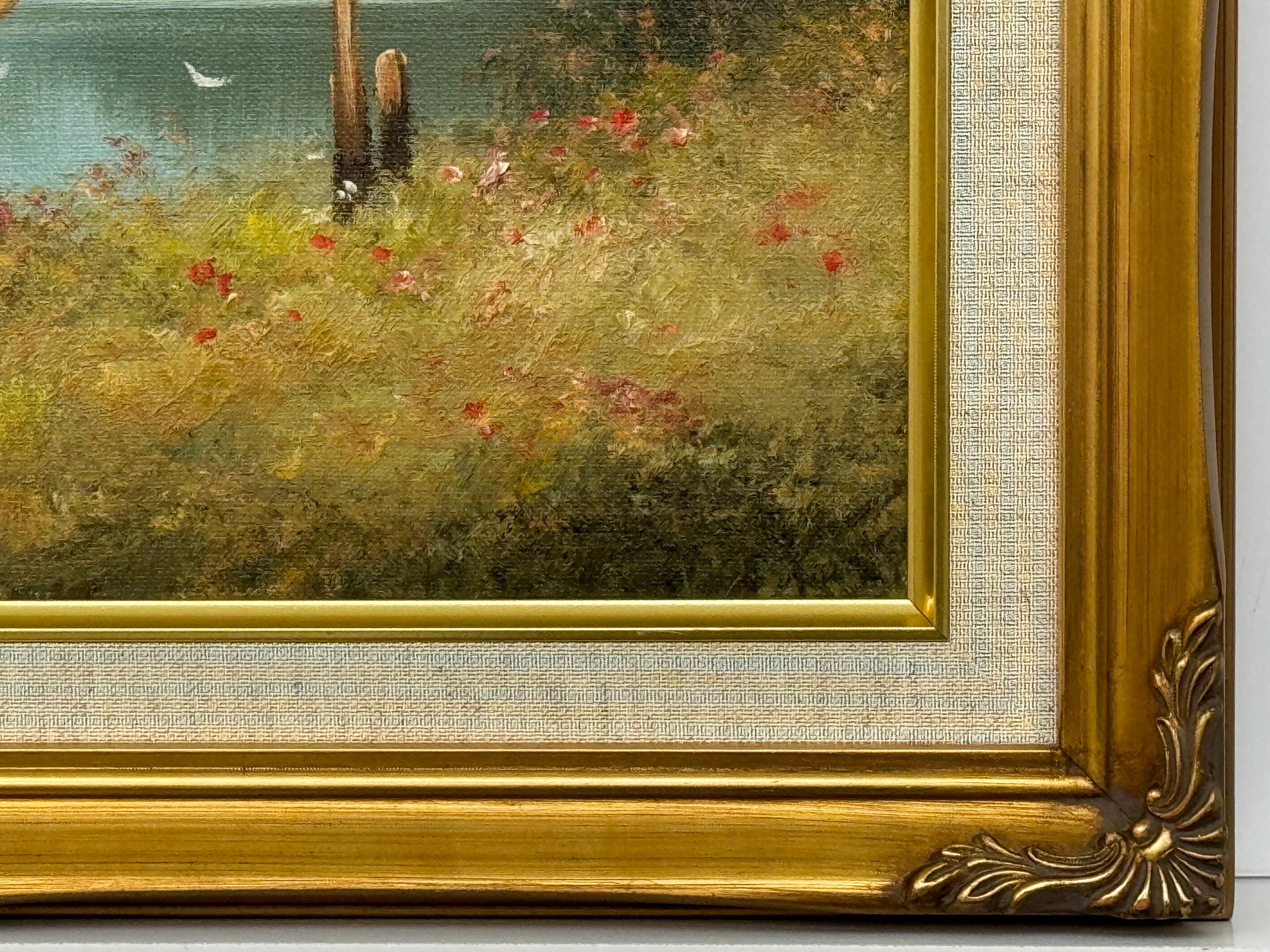Giovani ragazzi che pescano lungo il fiume in un prato di fiori selvatici nella campagna inglese 6