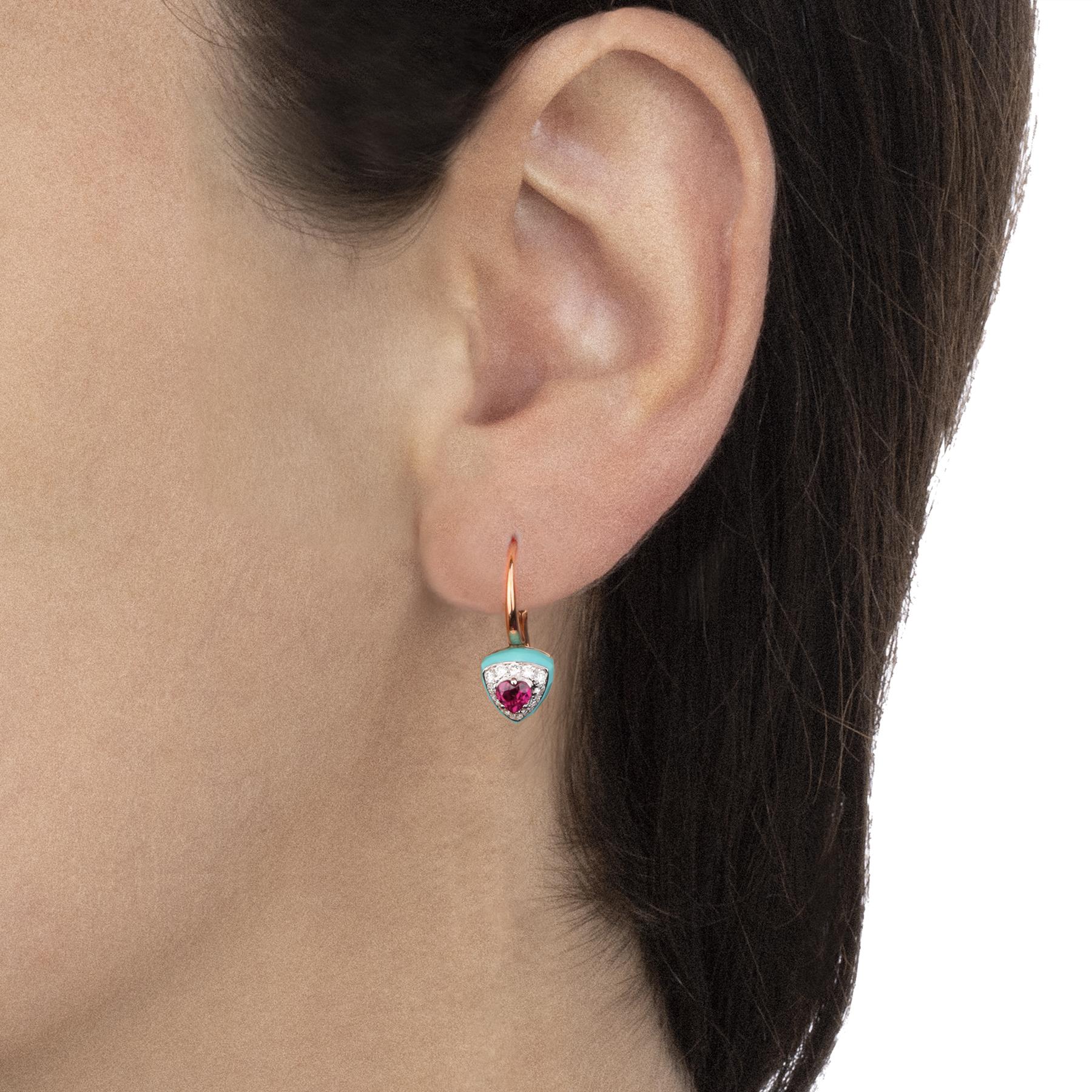 Precious rose gold earrings characterized by intense and fresh colors. A playful harmony of colored stones and shiny diamonds for a contemporary design.

Cast rose gold earrings, triangle cut turquoise 4.10 ct, diamonds pavé of 0.38 ct on white gold