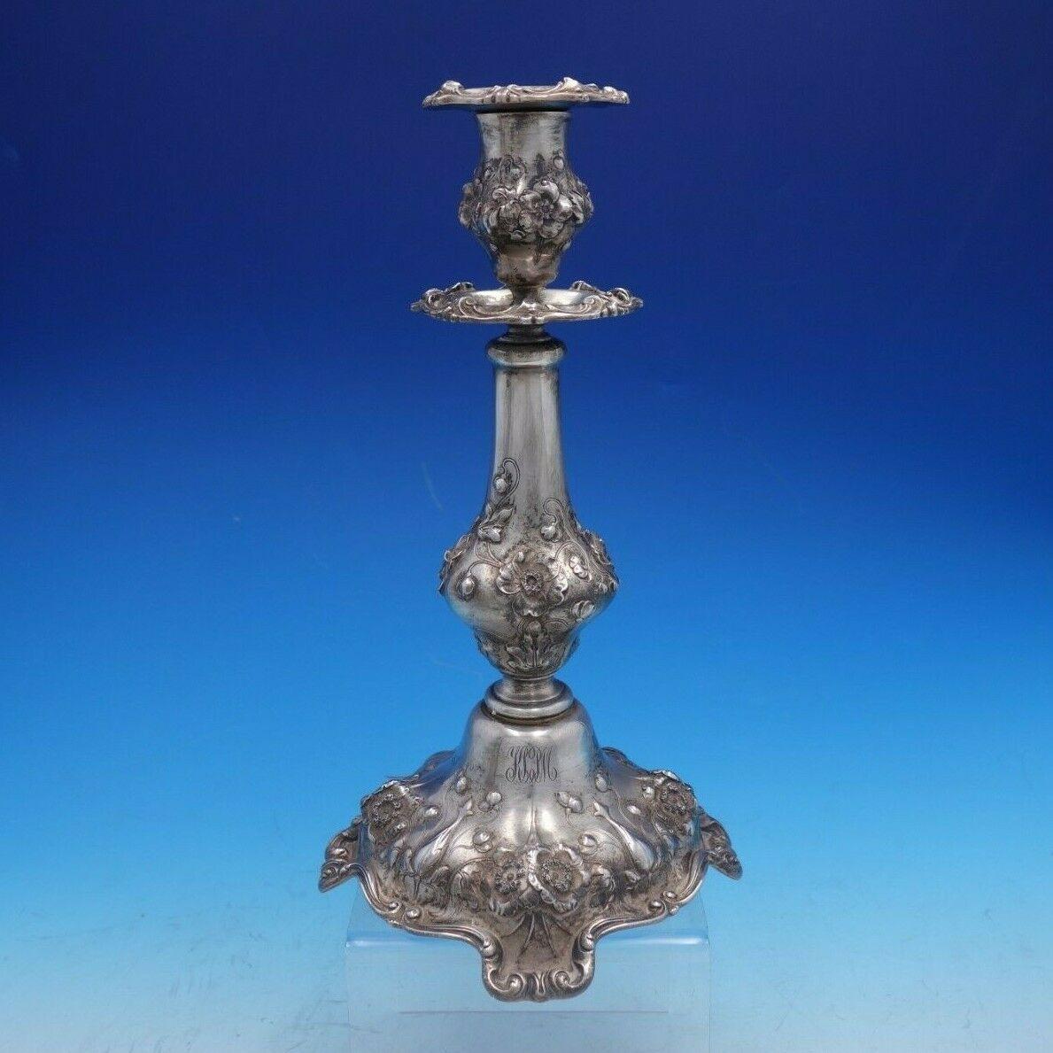 Reed & Barton

Les Six Fleurs by Reed & Barton pair of sterling silver candlestick holders marked #500A. They measure 11 1/4