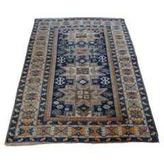 Lesghi Star Kazak with a Versatile Palette of Neutrals and Blues c.1900