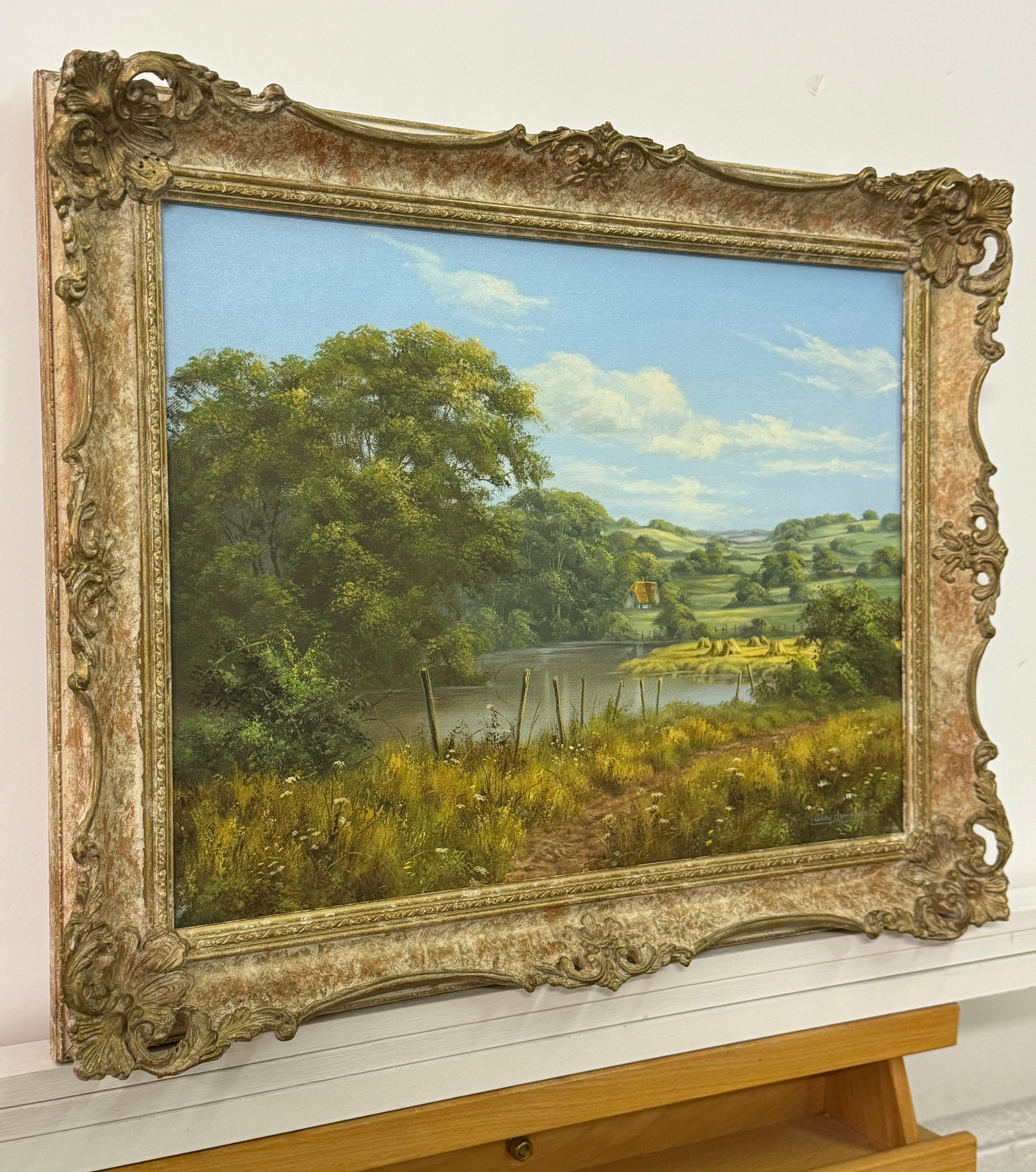 Lush Green English Countryside with Cottage & River by British Landscape Artist - Brown Figurative Painting by Lesley Hammett
