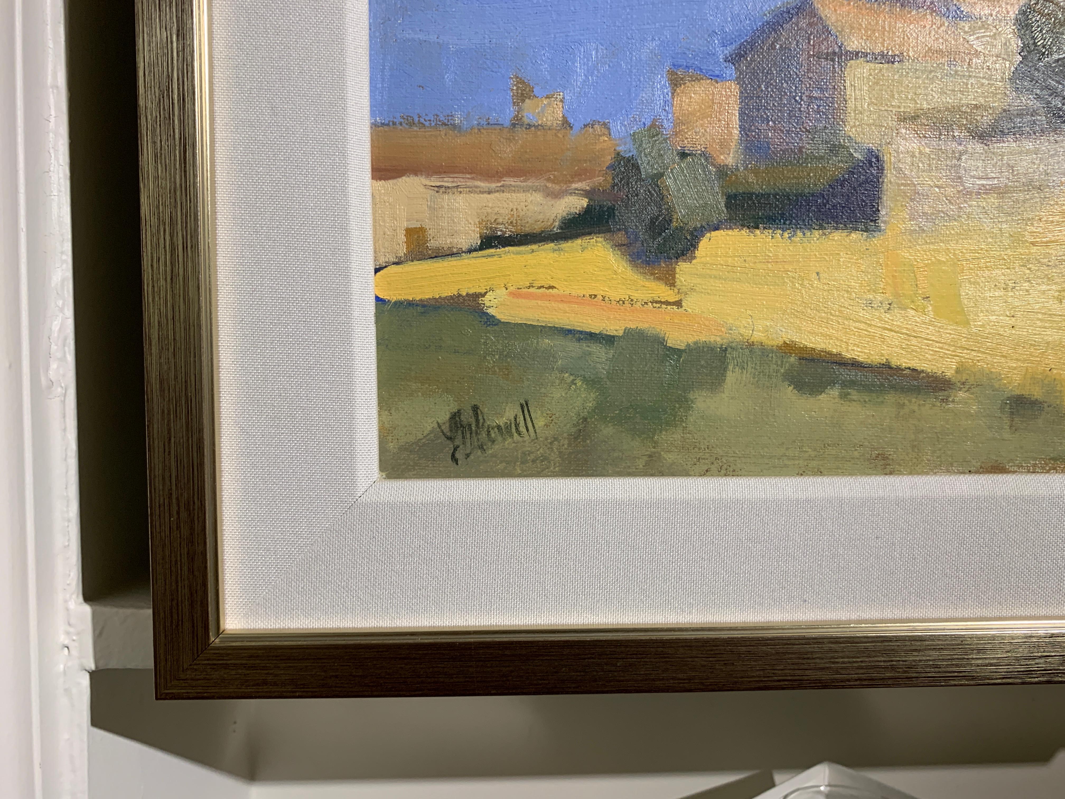 'Morning at Murs' us a small horizontal oil on linen Post-Impressionist painting created by American artist Lesley Powell in 2019. Featuring a palette made of blue, beige, yellow and green tones, the painting depicts with large strokes, the charming