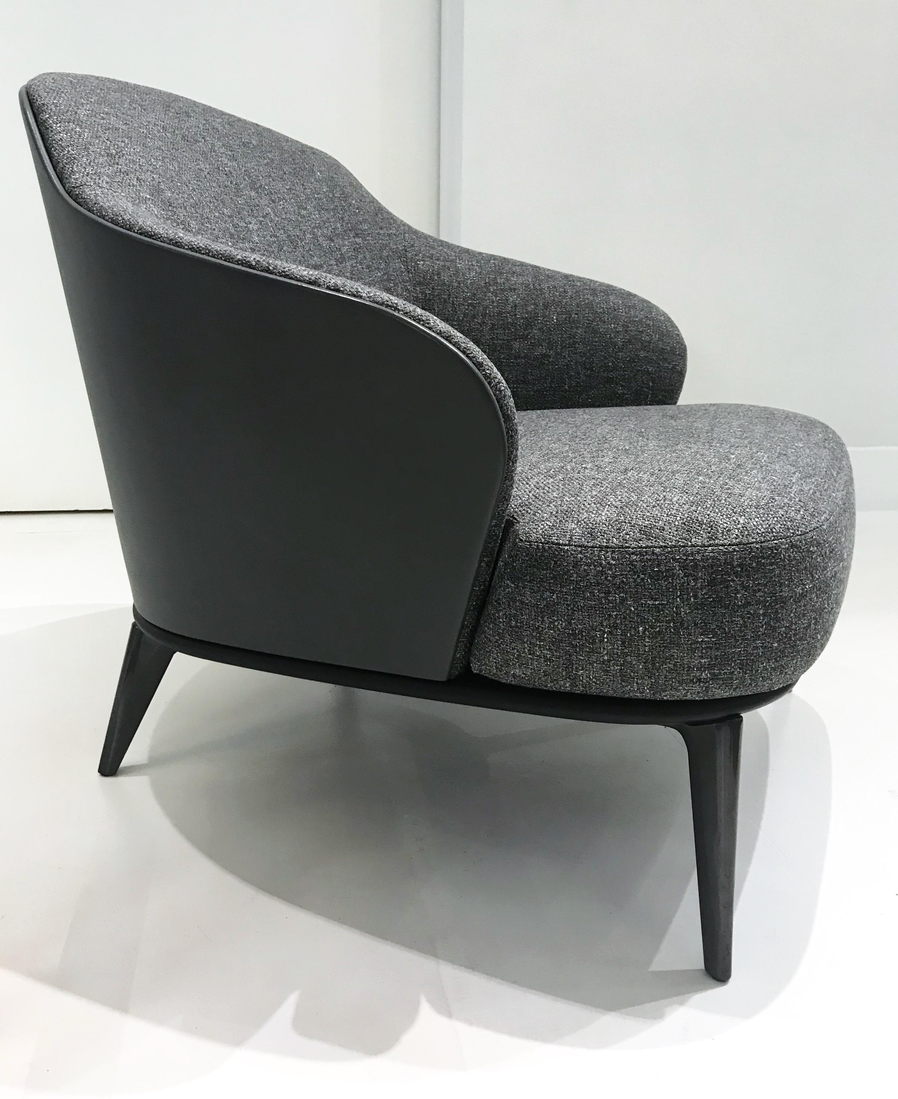 Armchair designed by Rodolfo Dordoni for Minotti - available in blue-gray leather back with gray melange fabric seat - patterned fabric cover also available separately.