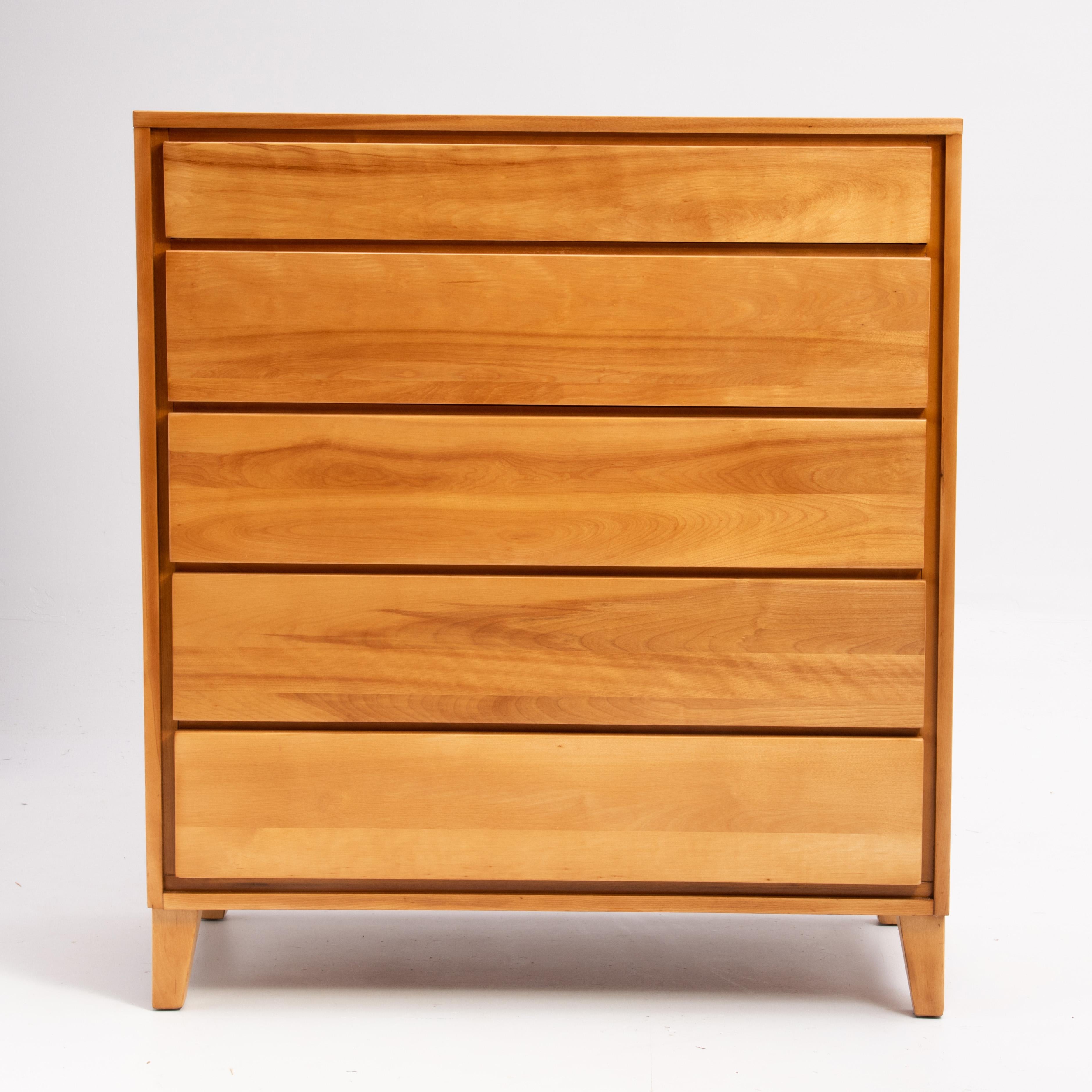 A Mid-Century Modern five-drawer solid birch dresser or chest of drawers by Leslie Diamond for the Conant Ball 