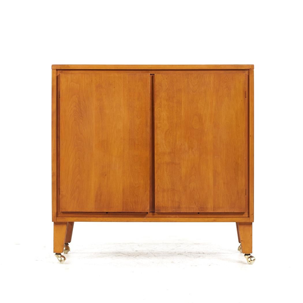 Leslie Diamond Conant Ball Mid Century Birch Record Cabinet

This record cabinet measures: 32 wide x 15 deep x 31.75 inches high

All pieces of furniture can be had in what we call restored vintage condition. That means the piece is restored upon