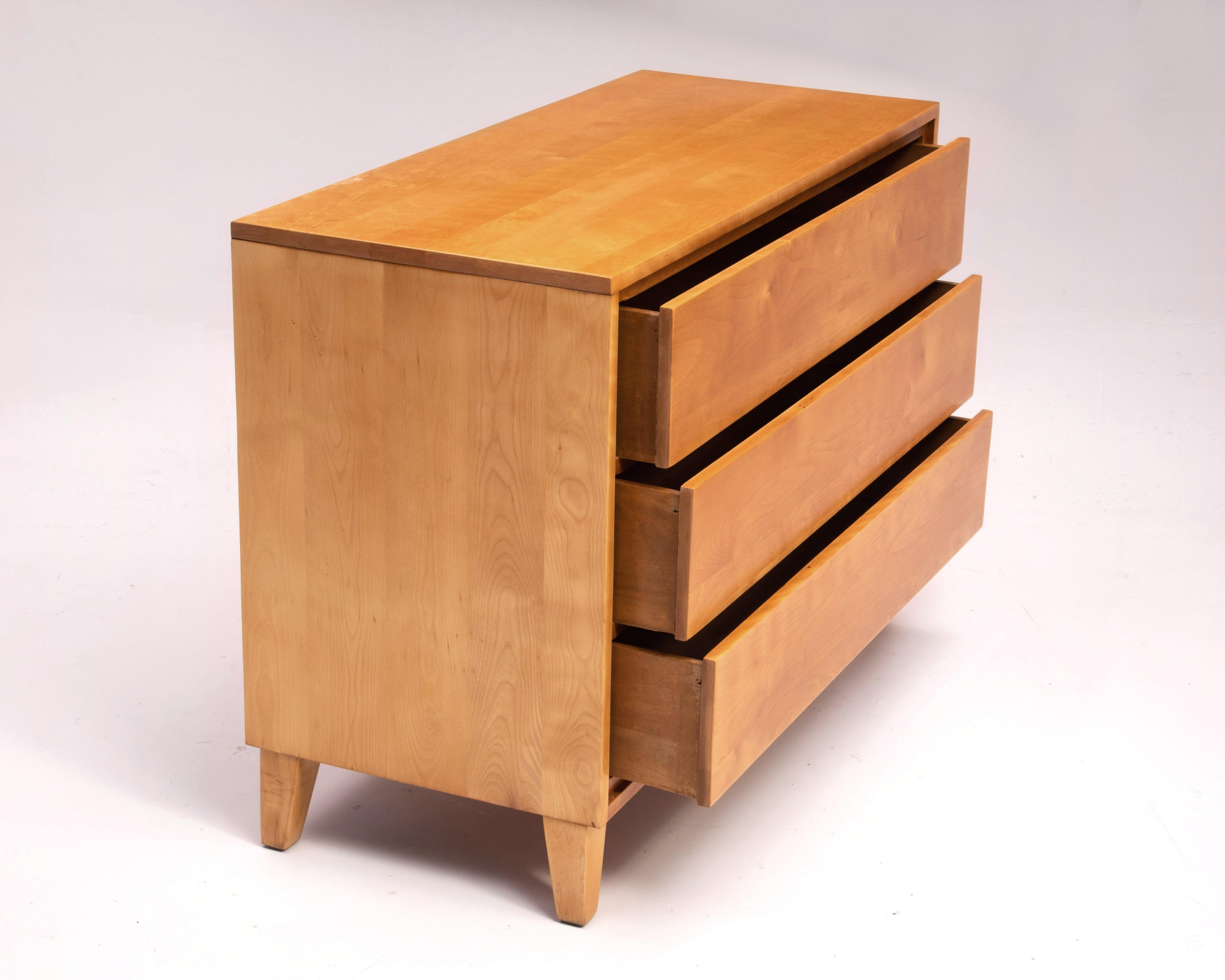 A Mid-Century Modern three-drawer solid birch dresser or chest of drawers by Leslie Diamond for the Conant Ball 