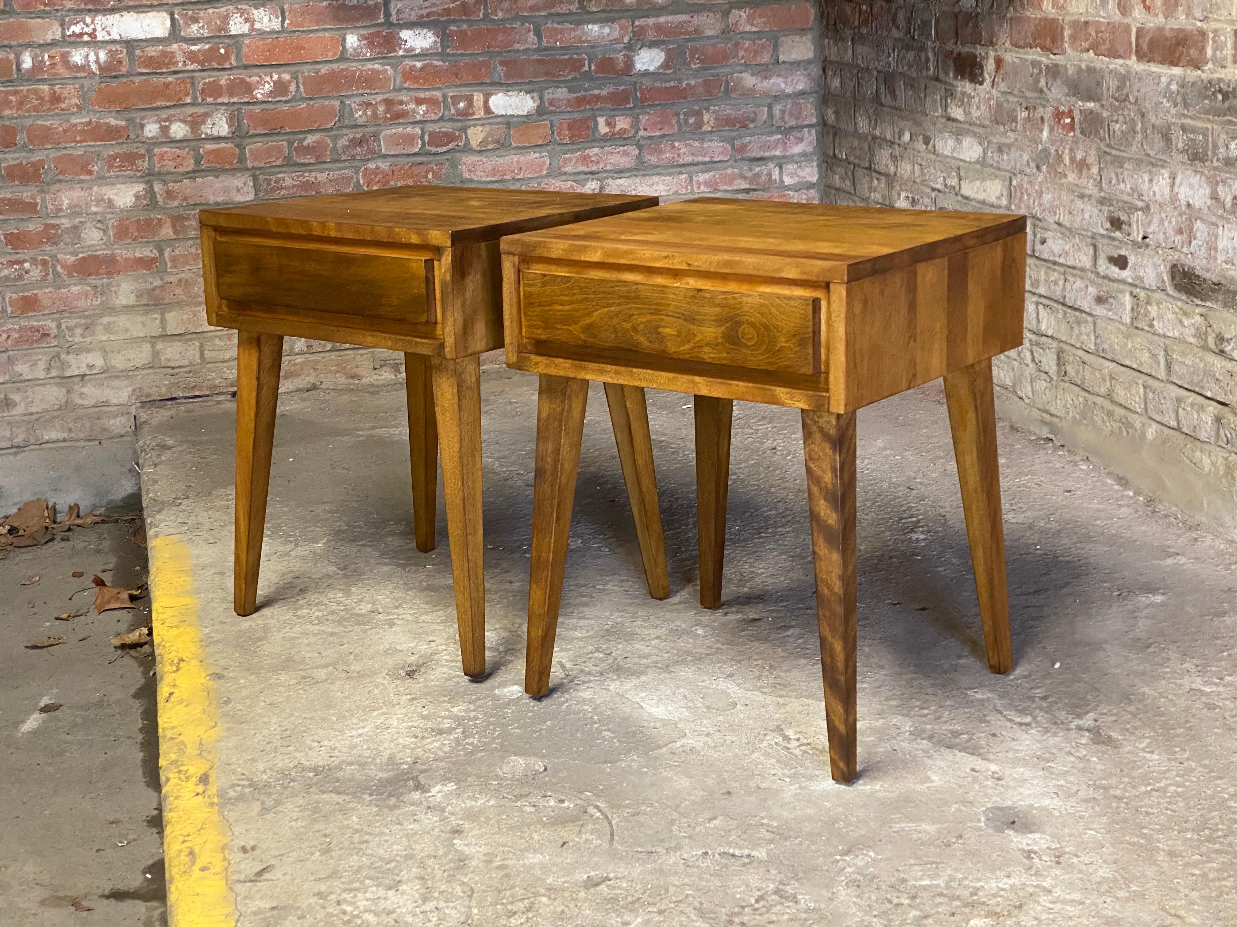 Classic simplicity by Leslie Diamond for Conant Ball American Modern Modern Mates line. Constructed from solid and durable hardwood maple and built to last. Circa 1950. These end tables can function in any office, bedroom or living room area. They