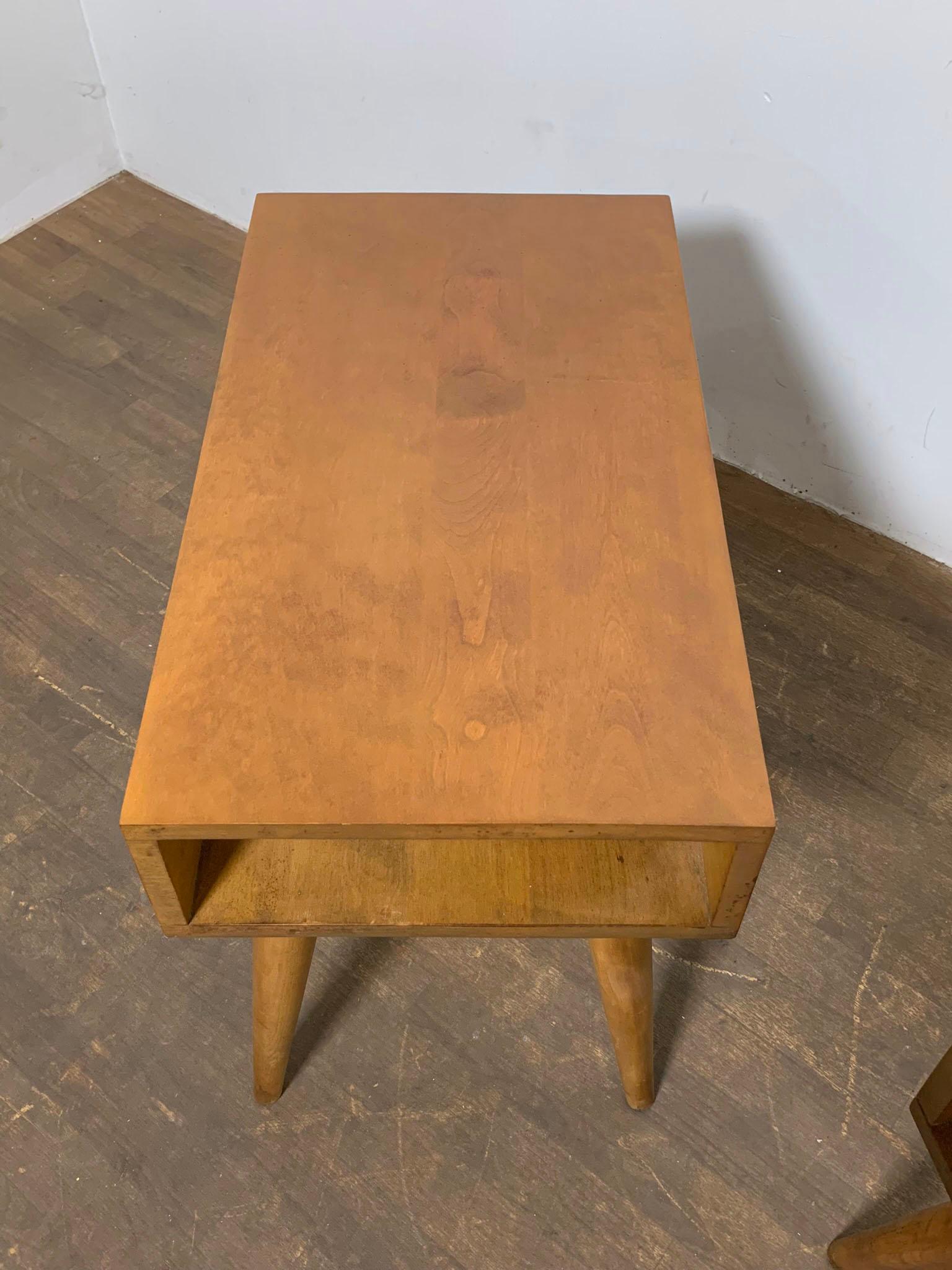 Pair of end tables in solid maple by Leslie Diamond for Conant Ball, circa 1950s.