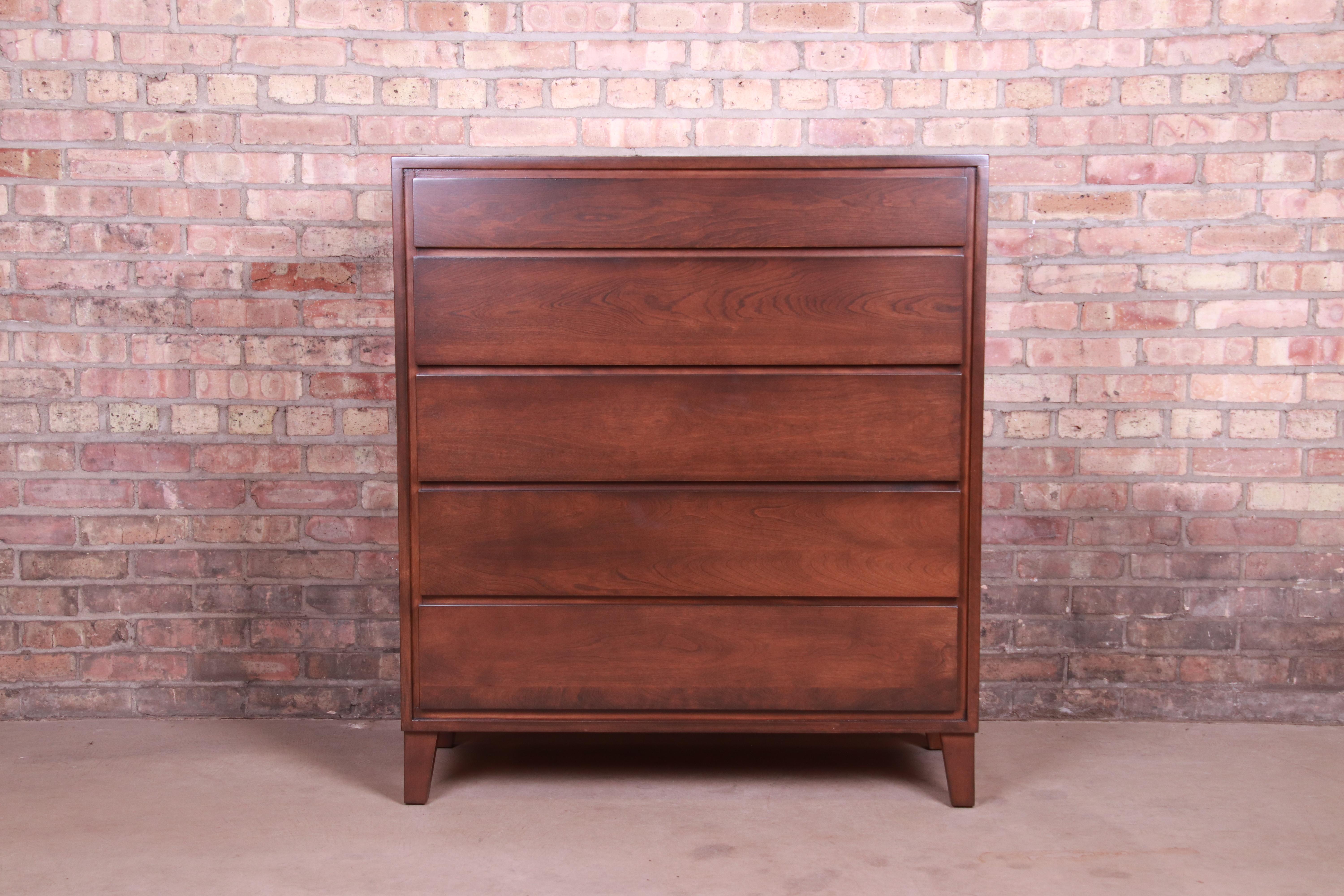 An exceptional Mid-Century Modern five-drawer solid birch highboy dresser

By Leslie Diamond for Conant Ball 