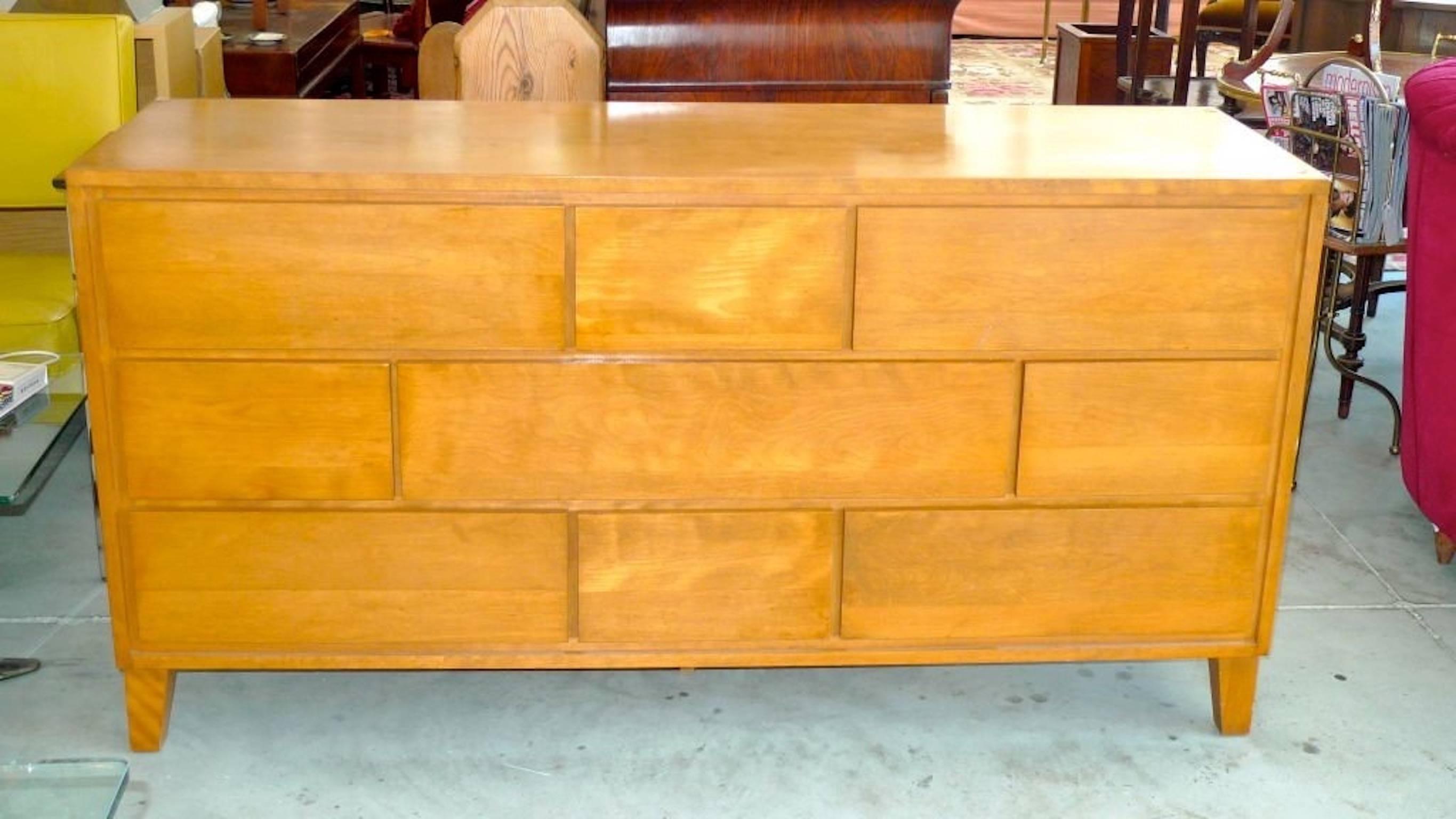 We have two available. Price shown is for one.

This stylish staggered nine drawer console dresser was designed by Leslie Diamond for the widely popular ModernMates Collection manufactured by Conant Ball of Massachusetts, circa 1947.  
Solid birch