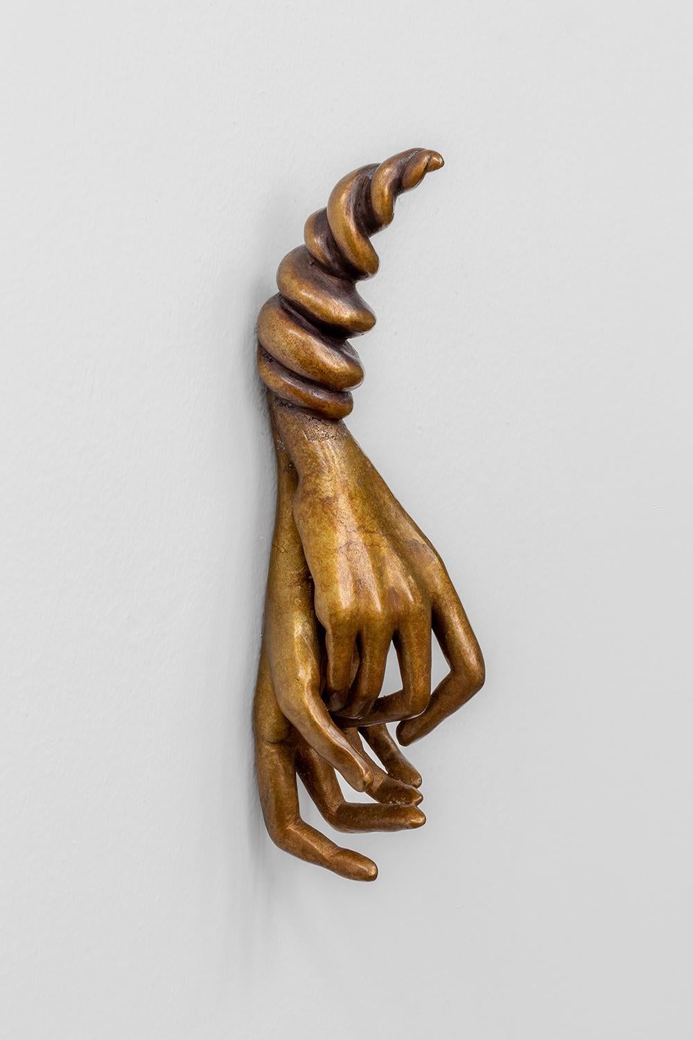 A 2023 recipient of the Vermont Governor’s Award for Excellence in the Arts,

Leslie Fry is represented in this show with fantastical sculptures of female hands, titled the “Cuffed” series.   Tensely poised and mannered gestures, inspired by