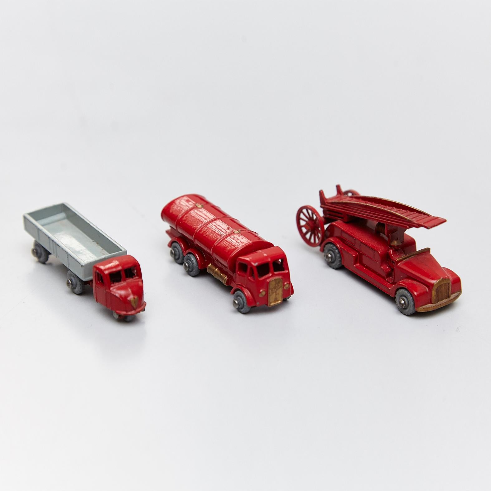 Three Red Fire Trucksfrom Lesney Matchboxes Series, circa 1950.

Lesney Products & Co. Ltd. was a British manufacturing company responsible for the conception, manufacture, and distribution of die-cast toys under the 