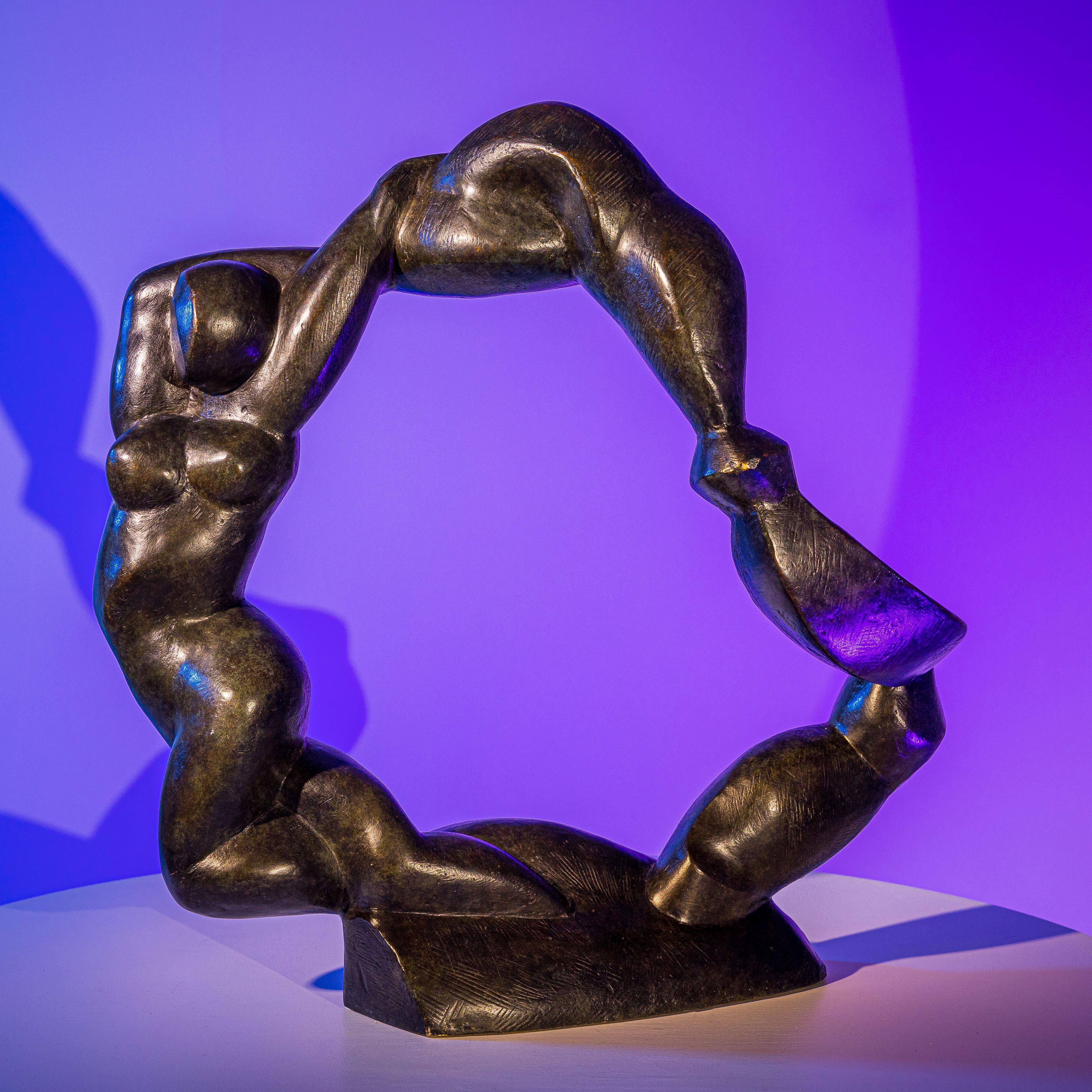 Large ring-shaped bronze in the form of an abstracted dynamic female body created by Henri Delcambre (1911-2003) in 1973. Stamped at the base. The surface has a texture formed by small strokes.