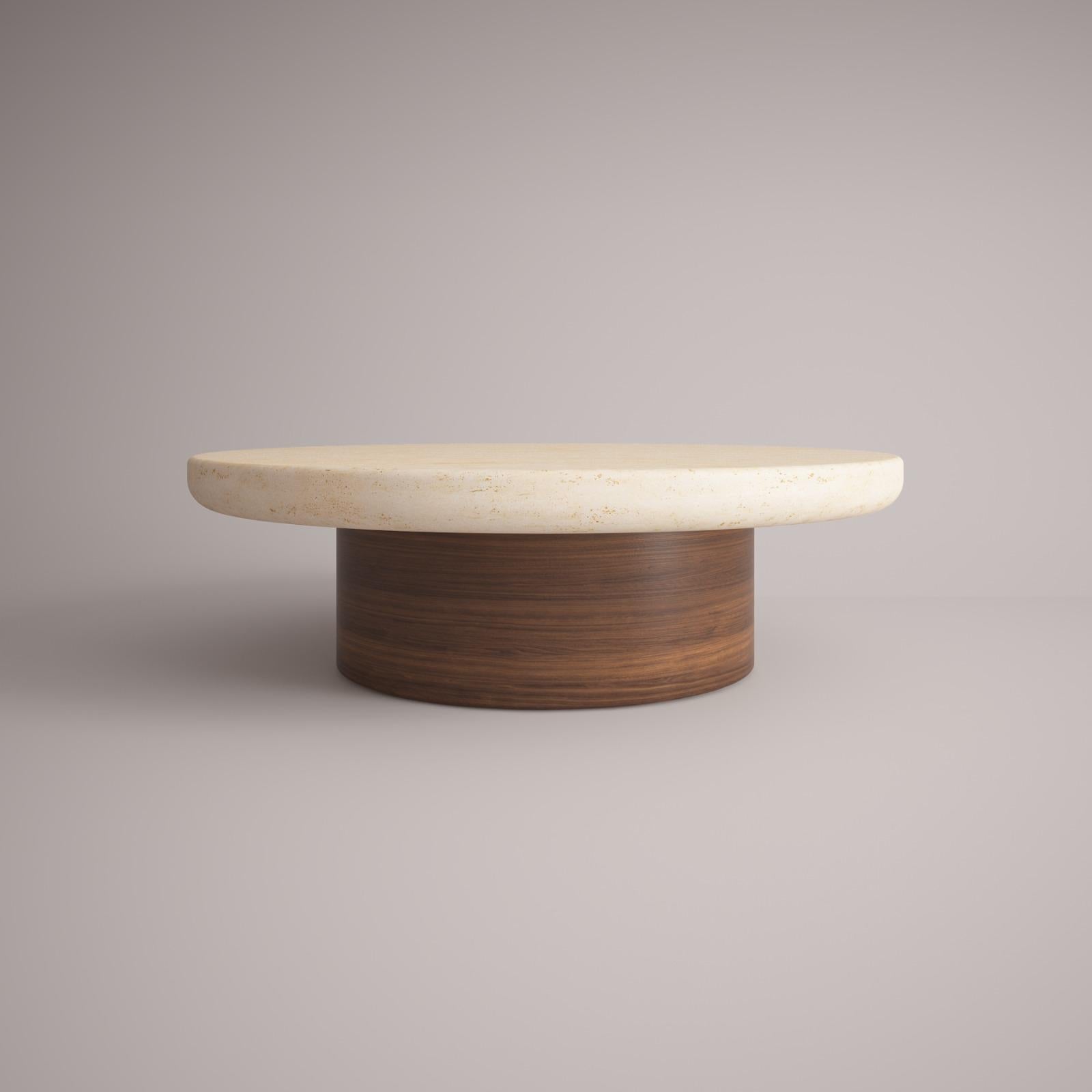 Lessa - 21st century European center table Designed by Studio Rig Travertino Wood

Collector brand was born and Portugal and aims to be part of daily life by fusing furniture to home routines and lifestyles. The company designs its pieces with the