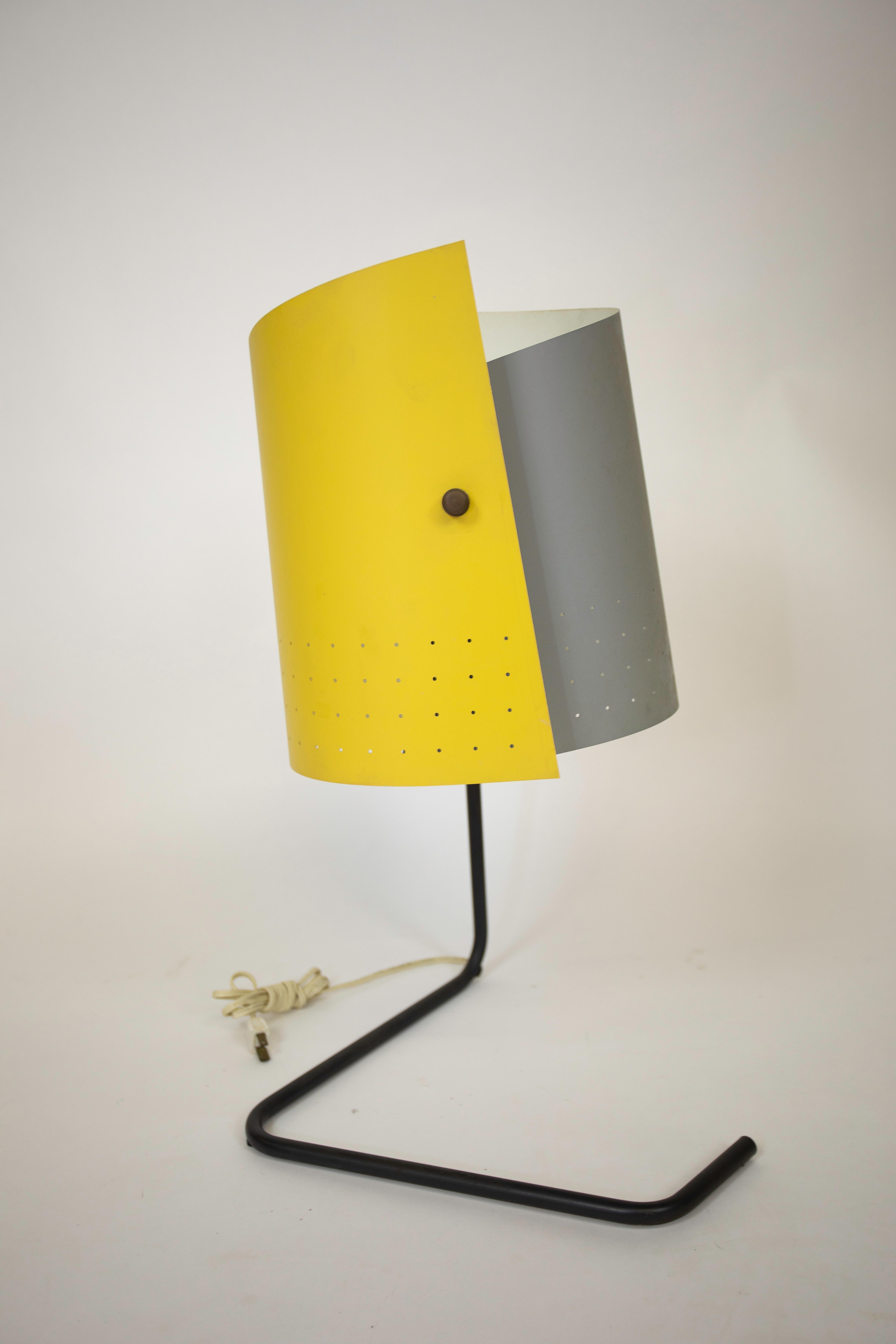 Manufactured by Heifetz Manufacturing in 1951.
This lamp was 1 of 10 lamps Chosen for the Museum of Modern Art's Low cost lighting competition in 1951.
Awarded honorable mention.
Original paint and surface.