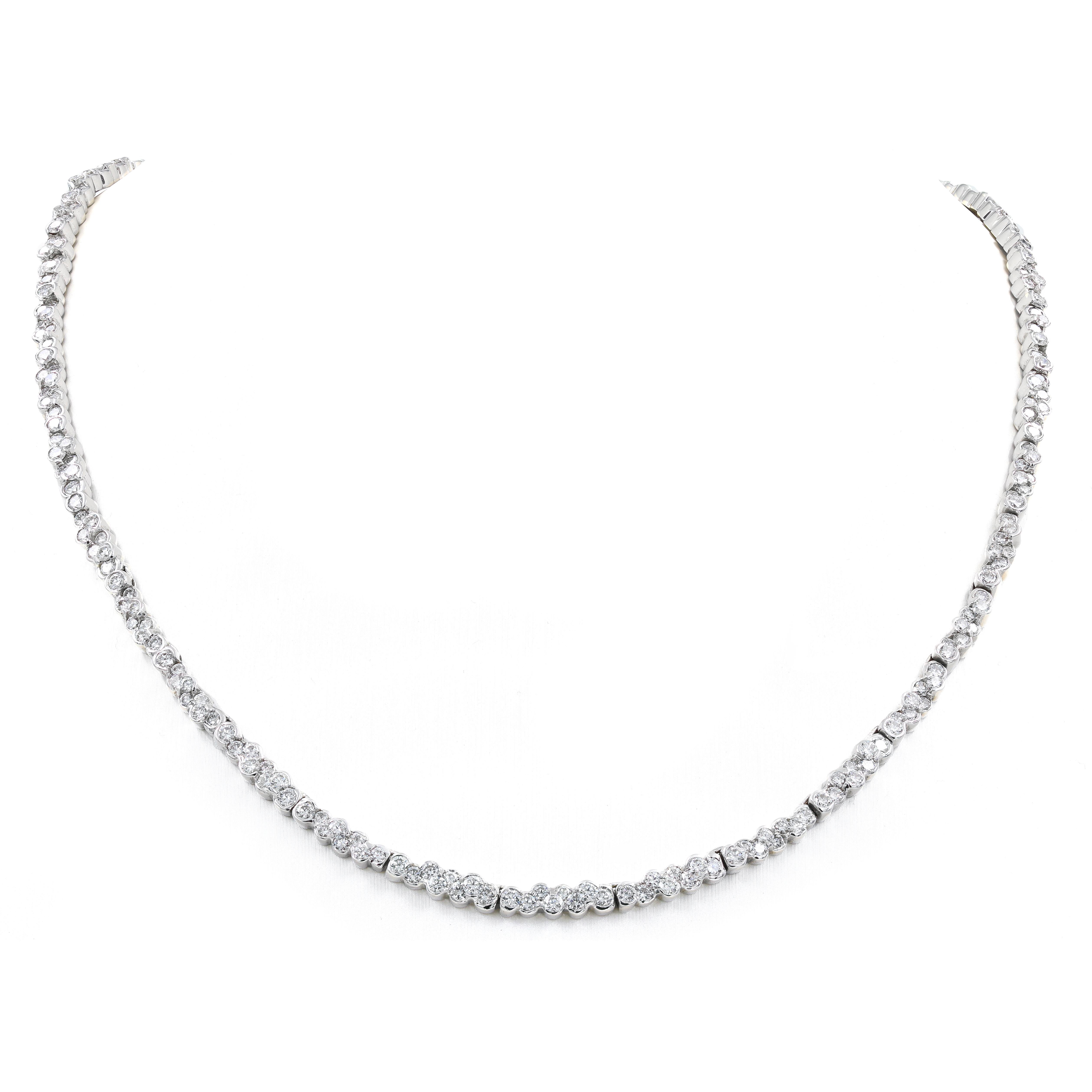 This magnificent Lester Lampert original CumuLLus® CeLLebration diamond necklace in 18kt. white gold has 288 ideal cut round diamonds= 10.50cts. t.w. The diamonds are G-H in color and VS in clarity. The necklace is 18 1/4