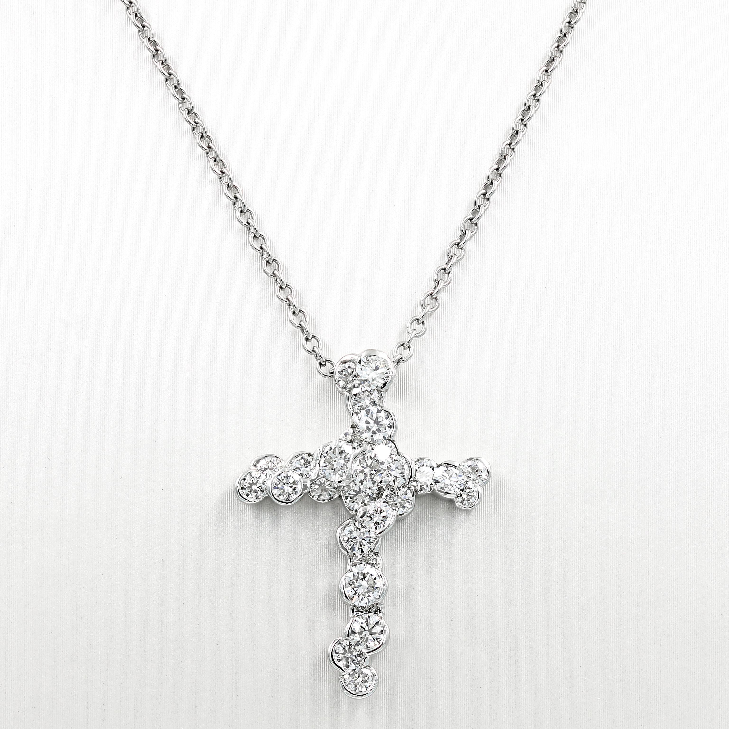 This creative custom crafted Lester Lampert CumuLLus® style necklace is set in platinum. It contains 28 ideal cut round diamonds= 1.73cts. t.w.  (the diamonds are G in color and VS clarity)

The piece is suspended from a platinum chain that is 18