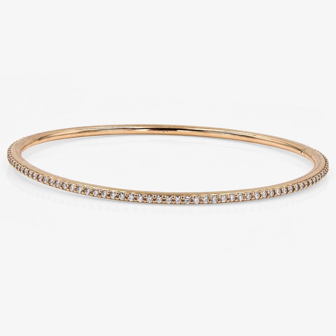 This Lester Lampert original D-Bead™ style bangle bracelet in 18kt. rose gold contains 114 ideal cut round diamonds= 1.82cts. t.w. There is no clasp.

Every Lester Lampert piece will arrive in an elegant custom jewelry box.