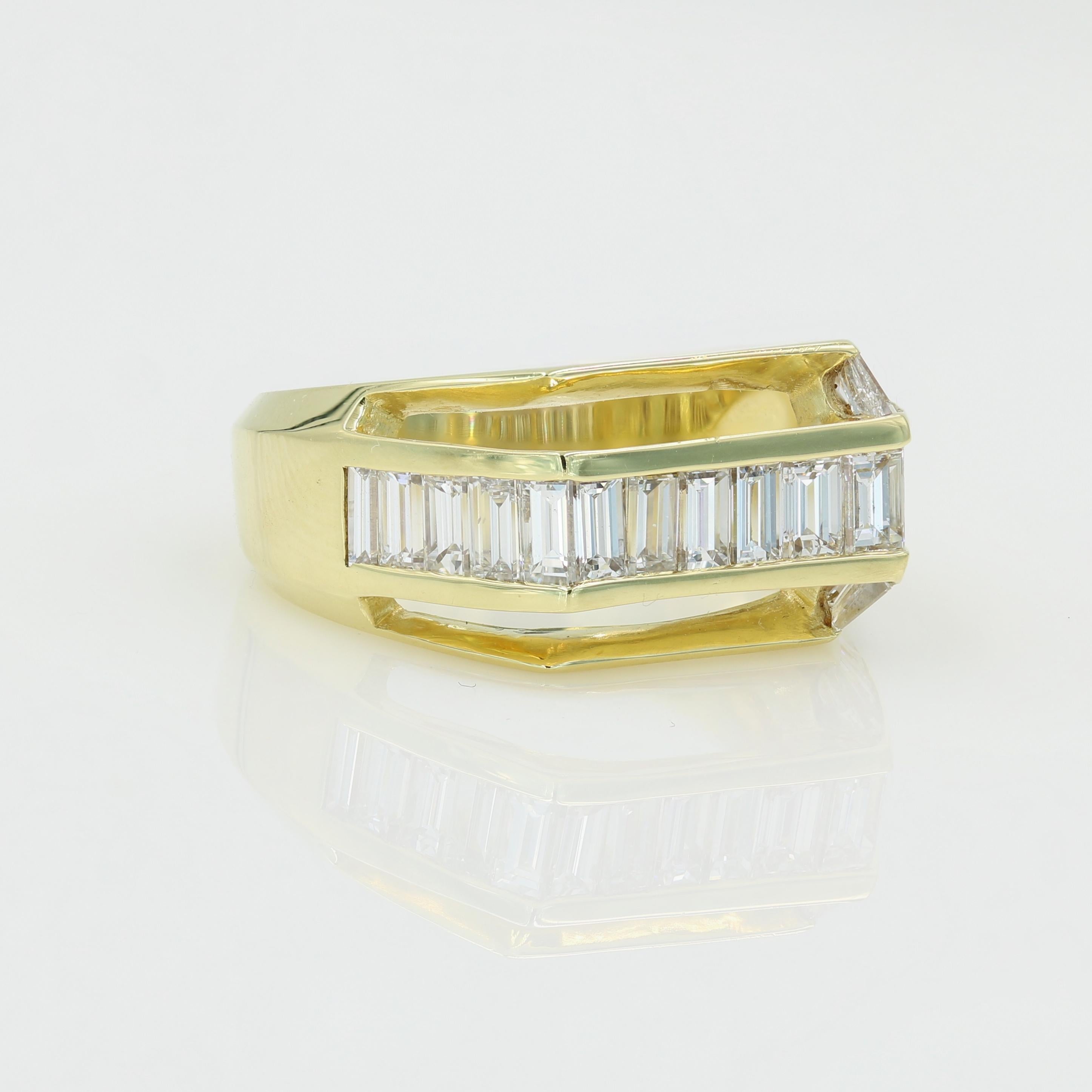 Lester Lampert original design gent's baguette diamond ring in 18kt yellow gold - 

Ring has 21 baguette cut diamonds (F-G VVS-VS1)  = 2.38cts tw.  This ring was originally part of the Lester Lampert wholesale division 