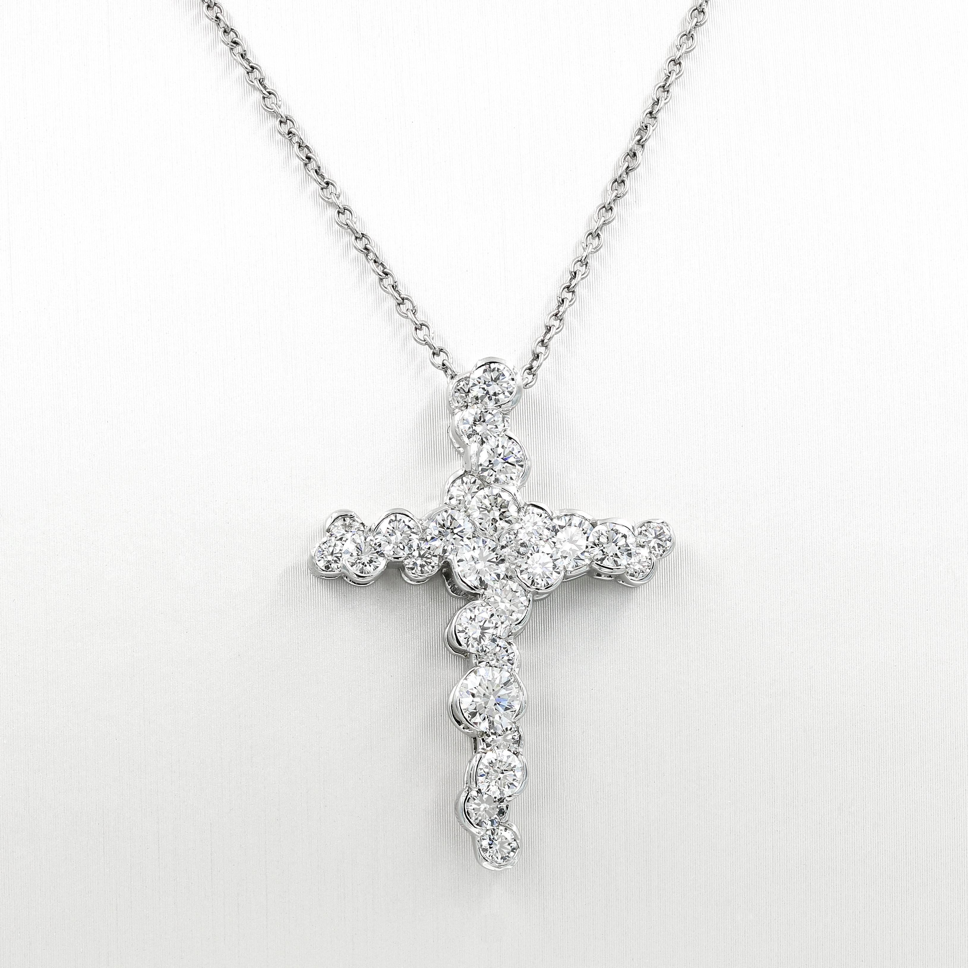 This creative custom crafted Lester Lampert large CumuLLus Collection® style necklace is set in platinum. It contains 28 ideal cut round diamonds= 3.31cts. t.w.  (the diamonds are G in color and VS clarity)

The piece is suspended from a fine