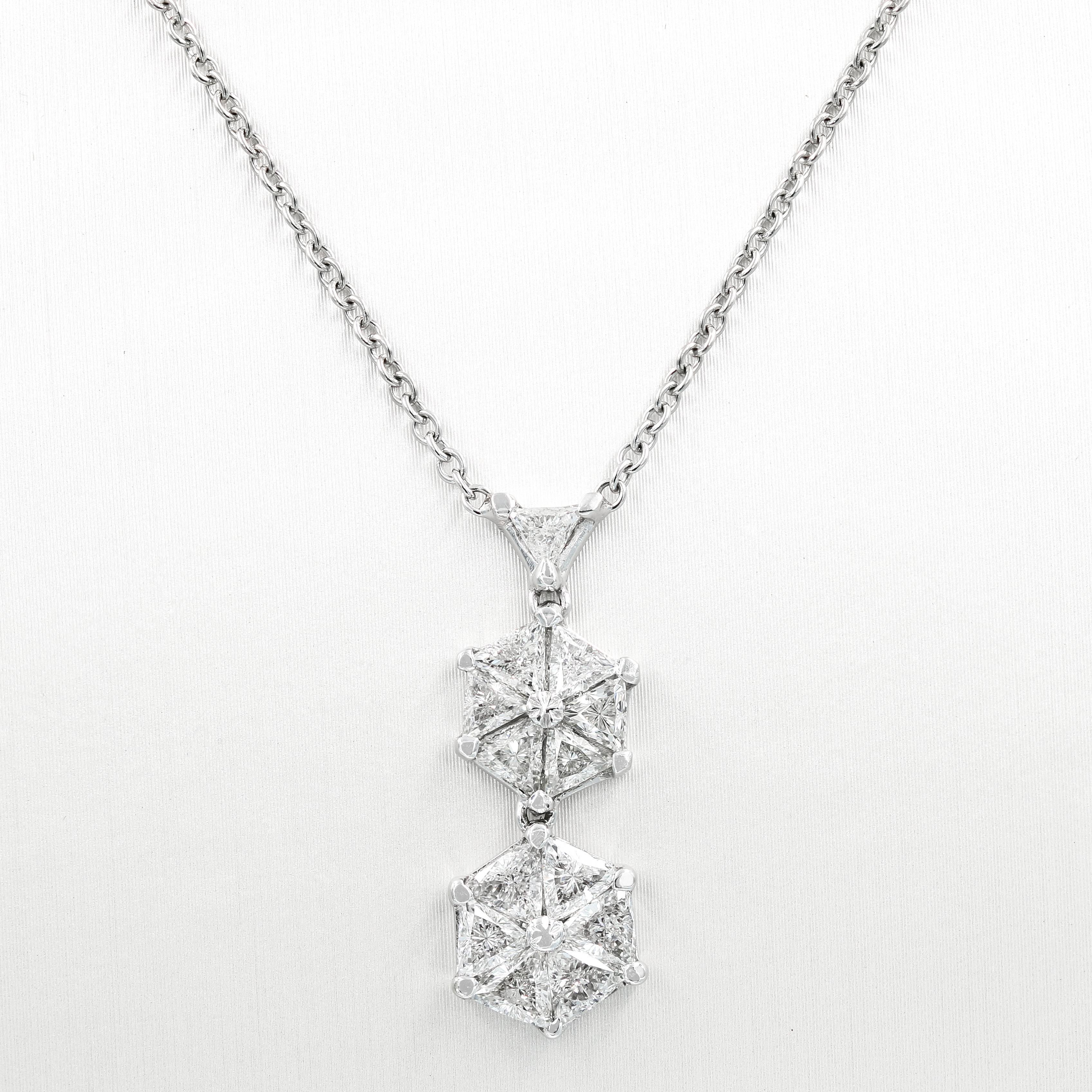 This elegant custom crafted Lester Lampert VoiLLa™ necklace is set in platinum with 13 trilliant cut diamonds = 1.59cts. t.w.  (the diamonds are G in color and VS-SI1 clarity)

The piece is suspended from a 16