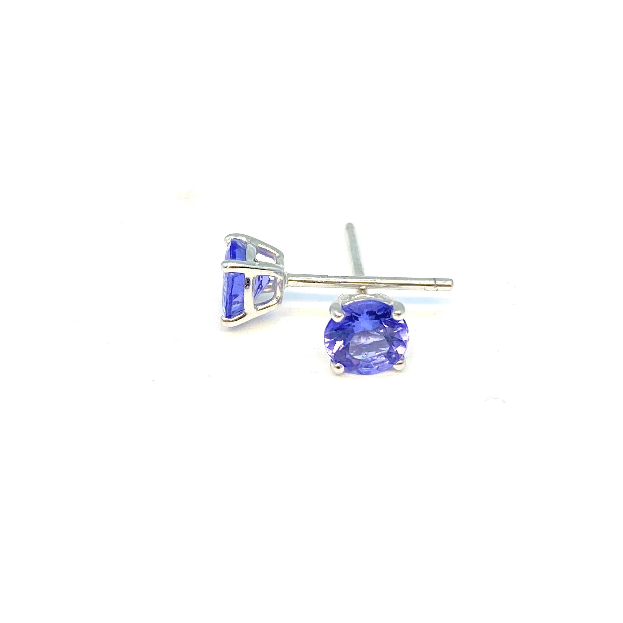 Stud earrings made from polished and rhodium plated 18K/ 750 white gold with 2 blue-purple brilliant cut tanzanites, 1.13ct., Ø: 5.1mm 
Height: 2.9mm

Introducing the Lesunja Earring Collection featuring white gold tanzanite earrings, designed to