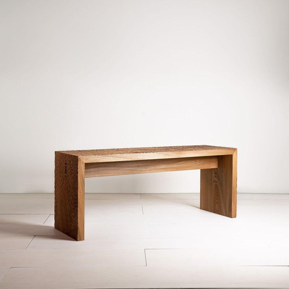 Leto Bench by Mythology
Dimensions: D 33 x W 160 x H 40 cm
Materials: Elm.

Available in elm or ash. Please contact us.

Designed to sit with our Leto dining table, the Leto bench is inspired by Japanese design. The bench combines a simple,