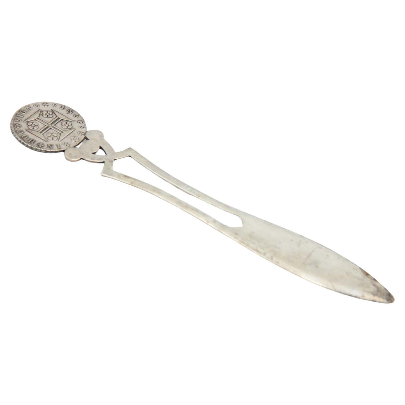 Brieföffner aus Silber mit eingeschnittener Klinge, mit einer 400 Reis-Münze von D. João VI.