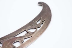 Letter opener in silver cut with fish figures
