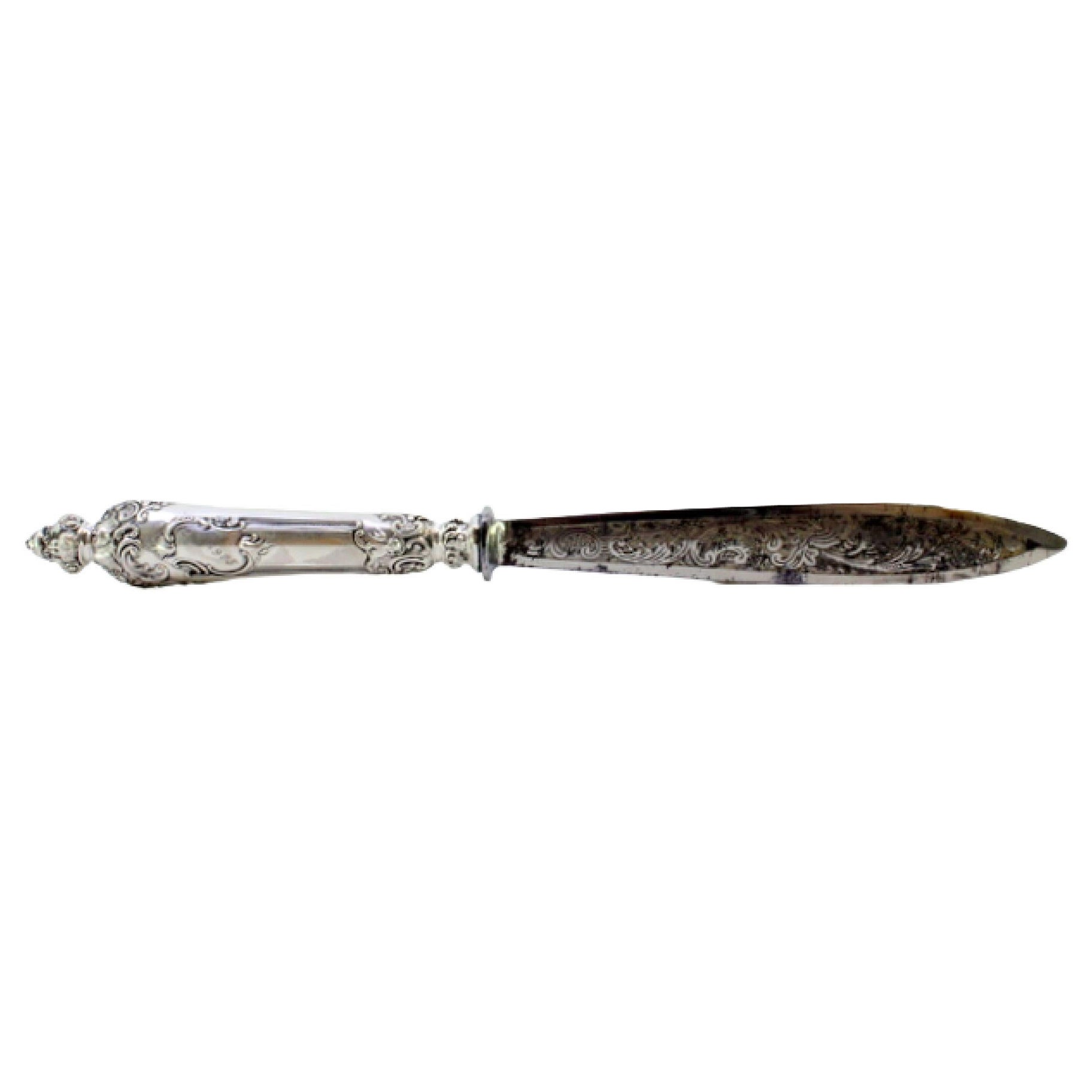 Letter opener in the shape of a knife embossed silver handle and large masks