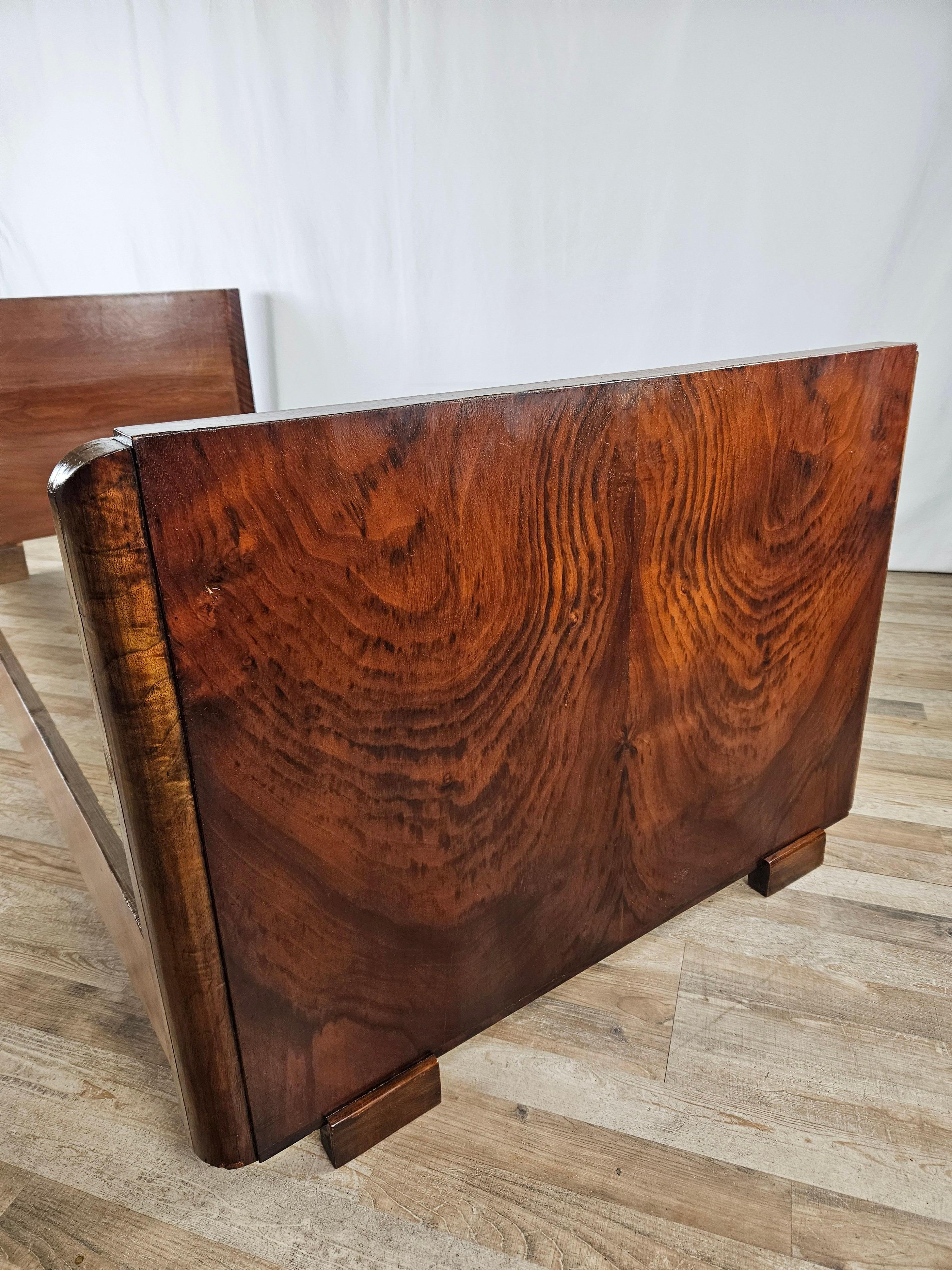 Early 1950s Art Deco-era single bed, frame entirely of walnut burl with softwood sides.

Oil and shellac polished cabinet, shows normal signs of wear due to age and use.

Measures:
L 90cm
D 204cm
H headboard 71cm
H footboard 63.5cm
Interior space