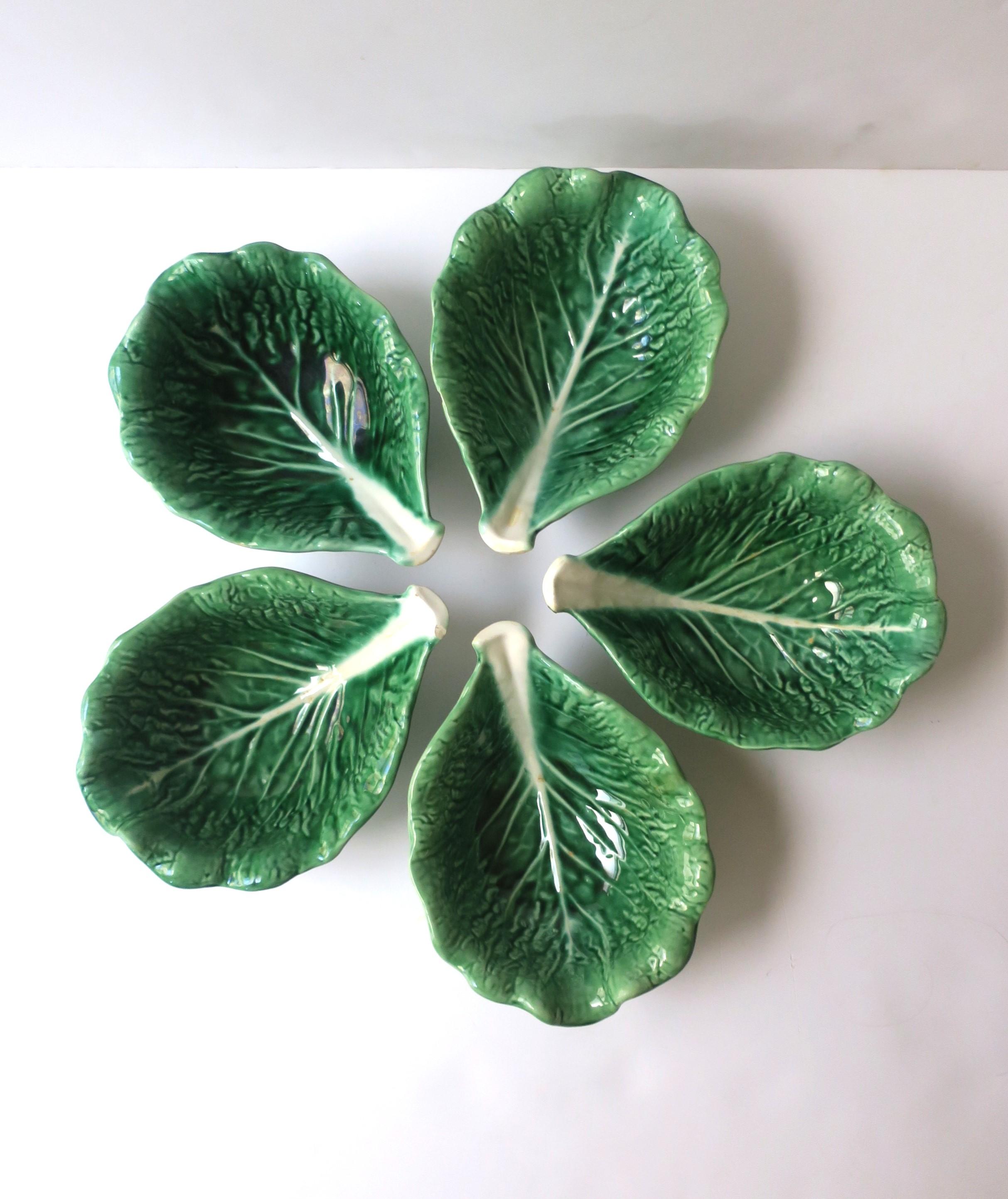 **There are five (5) green lettuce bowls available, each sold separately, as per listing. 

A vintage green and white lettuce or cabbage leaf serving or dip bowl, in the Palm Beach and Trompe l'Oeil styles, circa late-20th century, Portugal. A great
