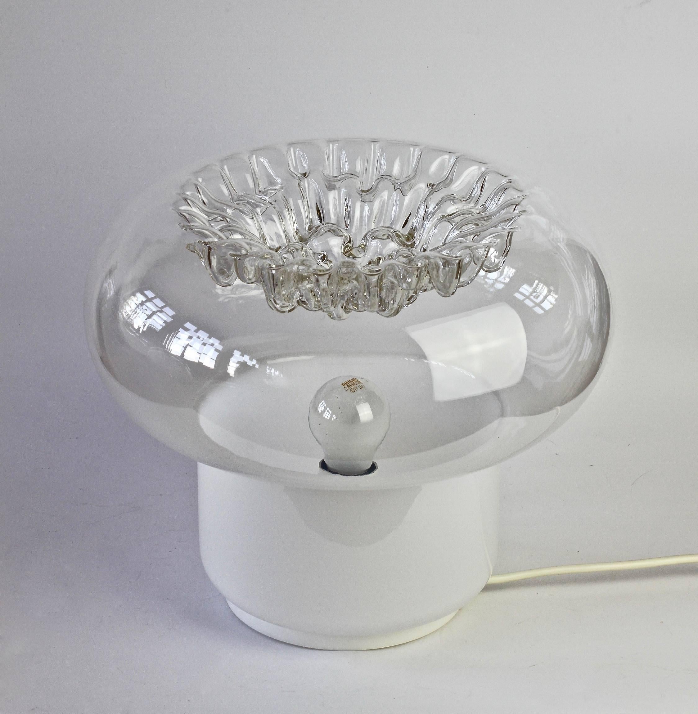 Mid-Century vintage textured glass table lamp attributed to Toni Zuccheri for VeArt circa 1970s . A fantastic design featuring wonderfully textured clear and white toned 'milk' glass. Featuring a futuristic and striking textured glass shade, which