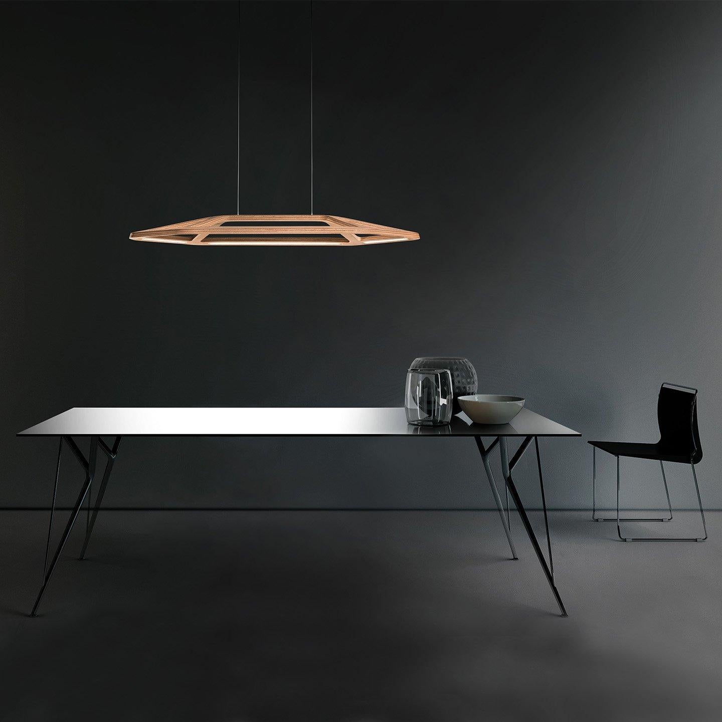 Aki, designed by Studio Dreimann in 2012, is a clever study of the use of new materials and forms. While Aki is a stunning presence, its leaf like form and solid okume wood frame is designed to be light beyond belief. Aki is constructed of solid