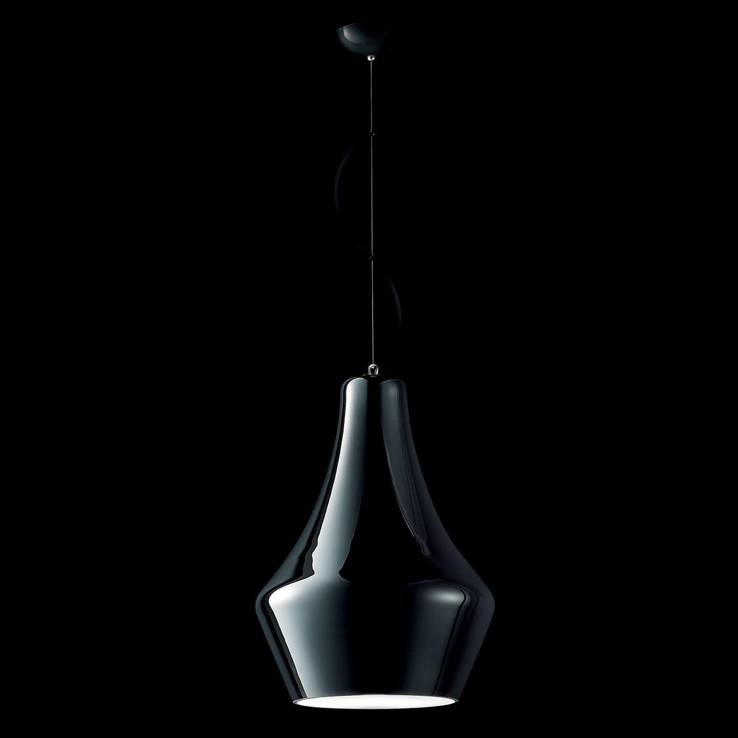 The Alma pendant is a striking and graceful pendant made with a traditional Murano hand blown glass technique called incamiciato (Italian for “jacketed” or “layered”), which requires multiple layers of glass during the blowing process. Created on a