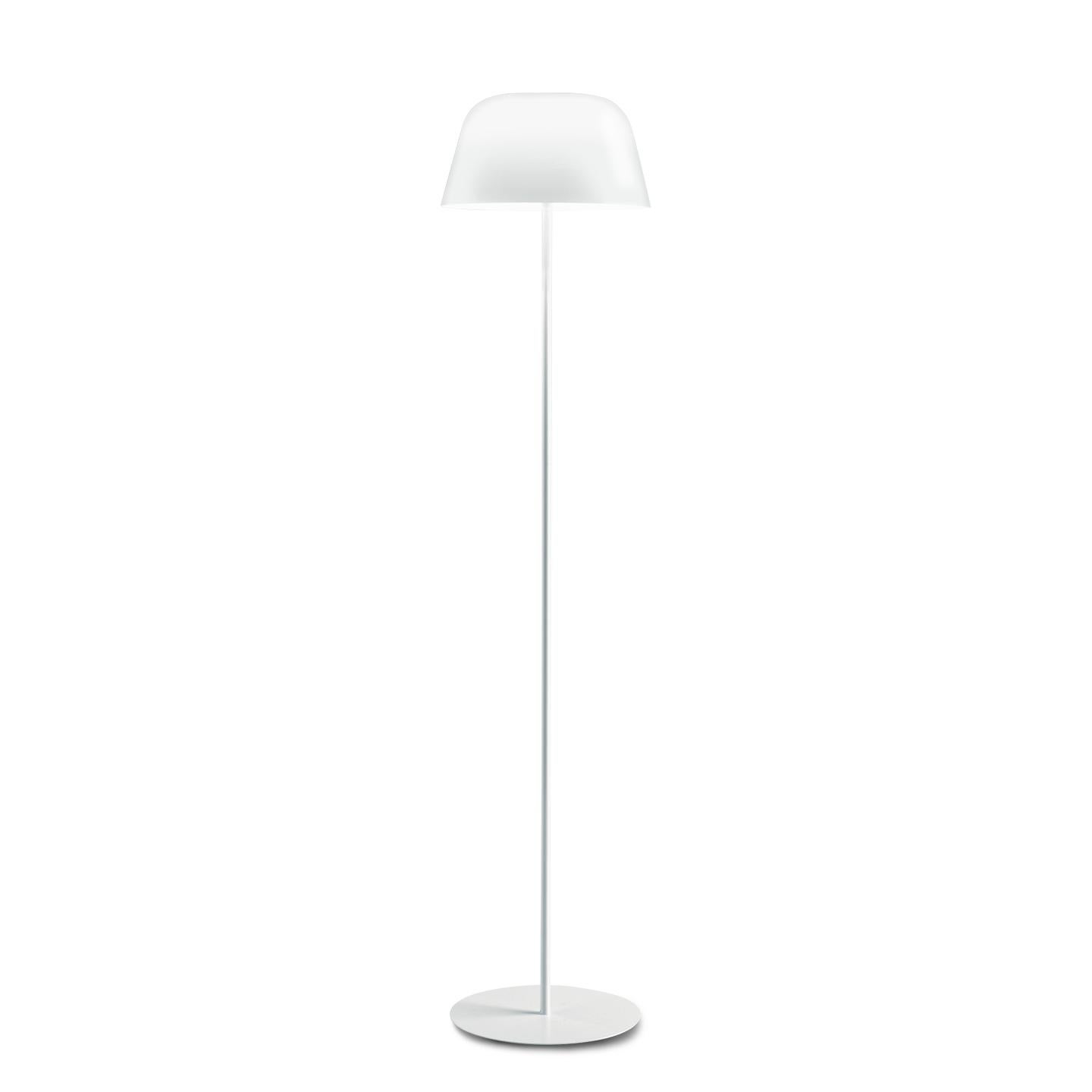 The Ayers floor lamp is designed with clean lines that create an impact. Designed by MarCo Piva in 2005, its hand blown diffuser is made of multiple layers of glass to create a rich, white look. This traditional Murano hand blown glass technique is