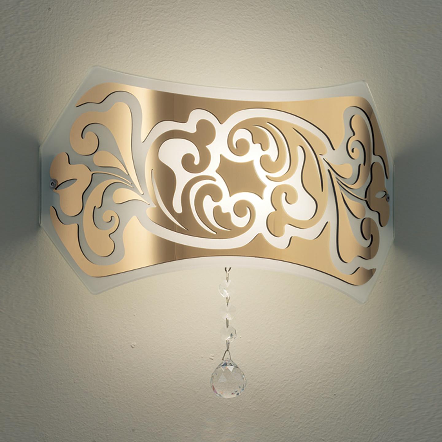 The Charme wall lamp, by Marina Toscano, is a great transitional design that is playful yet elegant. The hand blown glass diffuser features a vibrant pattern made with a silkscreen print and is further accentuated with a bass relief in either white,